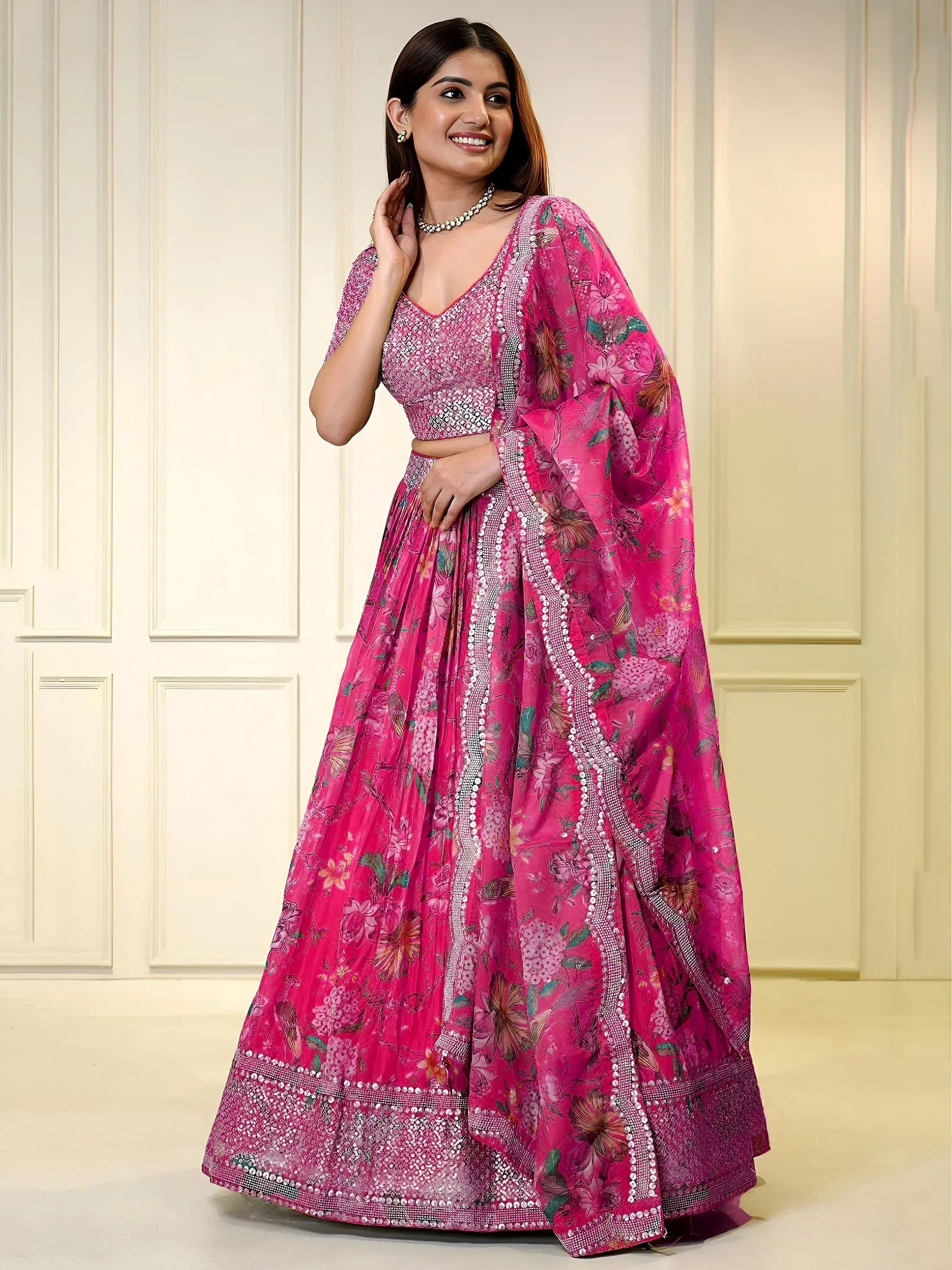 Pink floral lehenga choli with sequin embroidery, perfect for Indian weddings and festive occasions