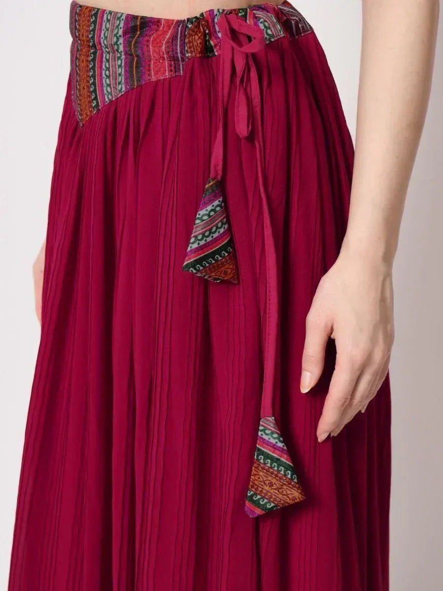 Maroon ethnic pleated skirt with colorful printed waistband and tie details