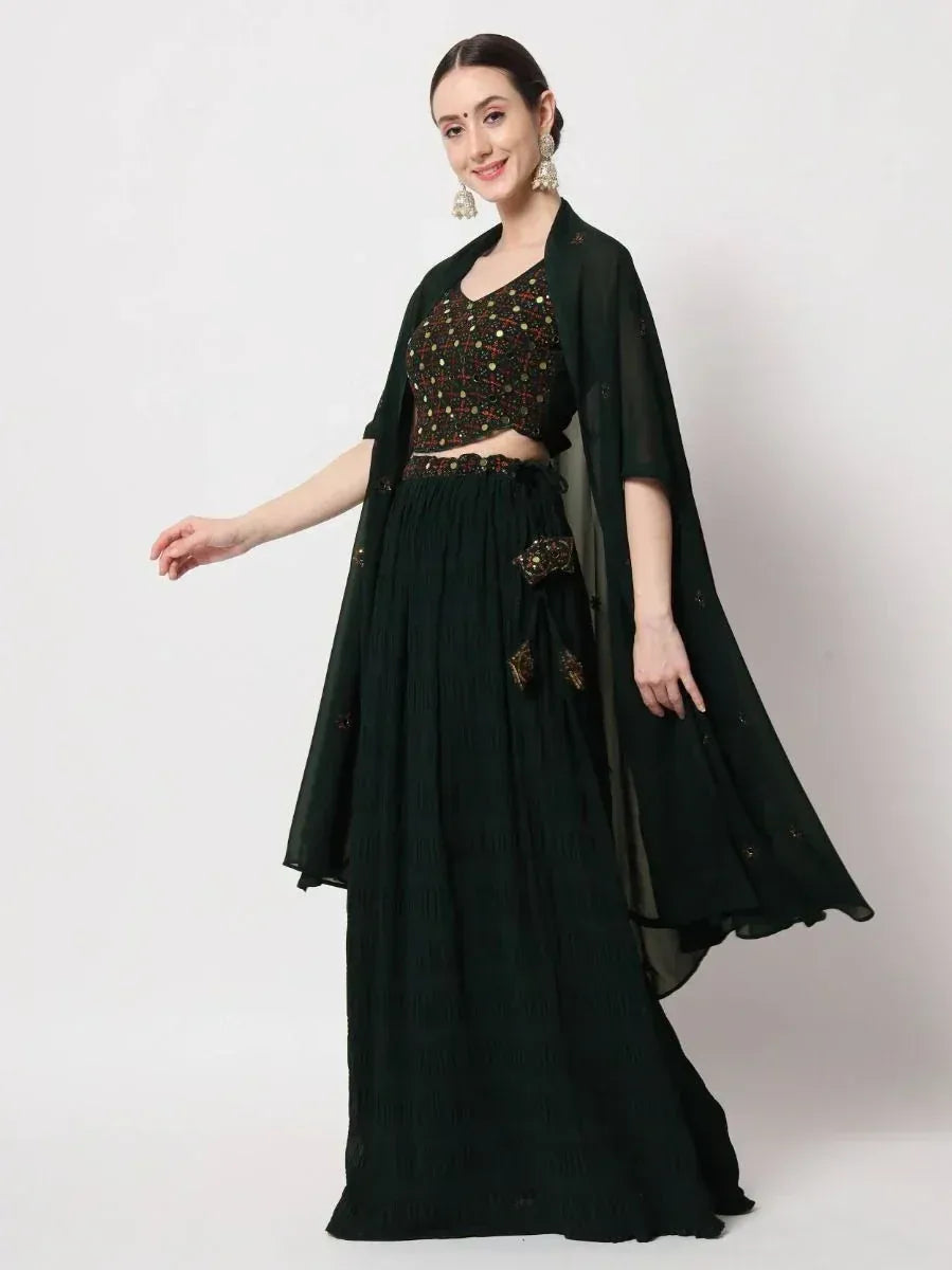Emerald green embroidered lehenga choli with sheer cape, perfect for Indian ethnic wear occasions