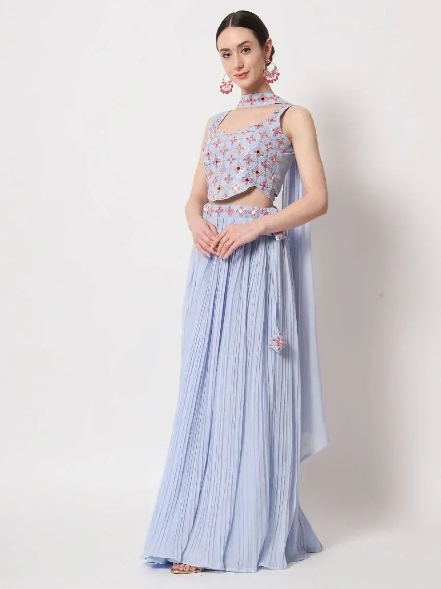 Light blue embroidered lehenga choli with pleated skirt and matching dupatta, perfect for Indian ethnic occasions.