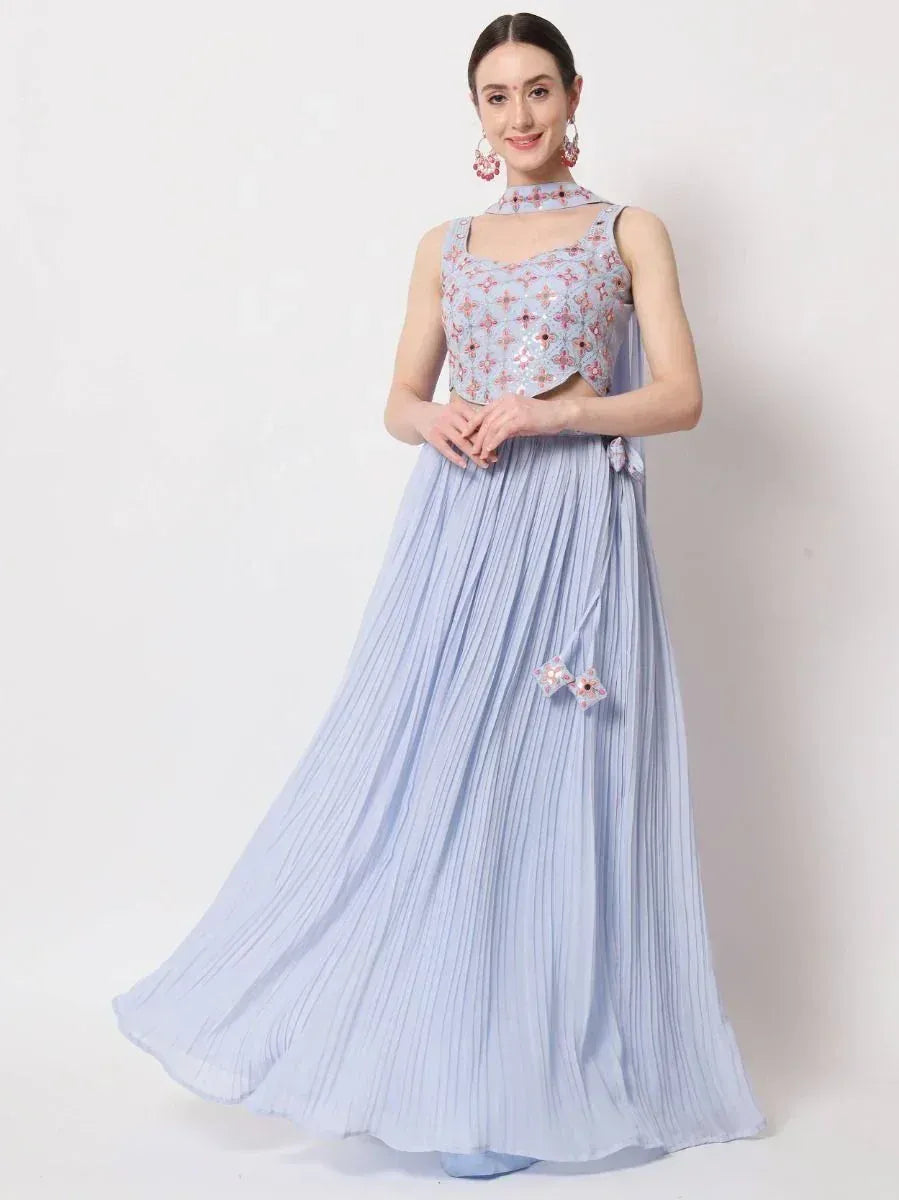 Light blue pleated lehenga with embroidered crop top, perfect for Indian ethnic wear occasions