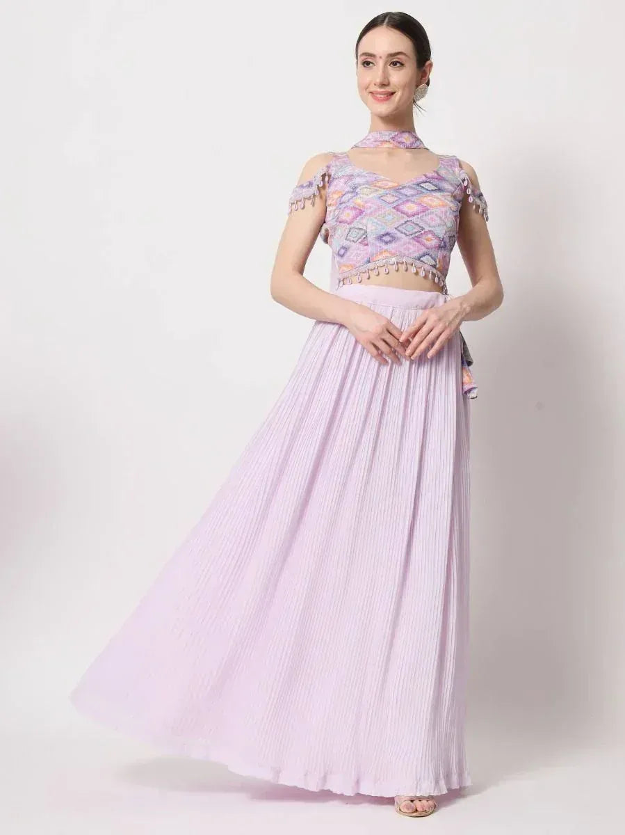Lavender ethnic lehenga choli with geometric print top and pleated skirt, perfect for festive occasions