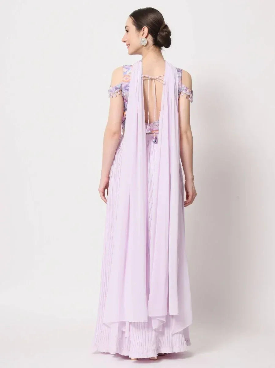 Lavender ethnic gown with floral cold shoulder top and pleated skirt, back view