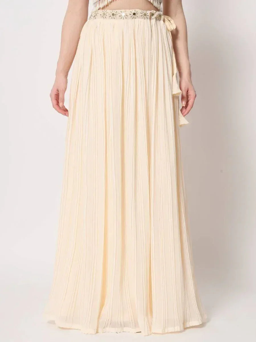 Cream pleated ethnic skirt with embroidered waistband, perfect for Indian festive wear