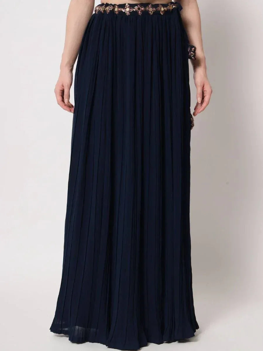 Navy blue pleated ethnic gown with embellished waistband, perfect for Indian occasions