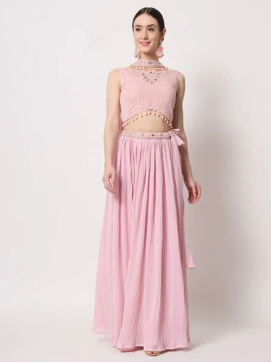 Pink ethnic lehenga choli with embroidered crop top and pleated skirt, perfect for Indian occasions