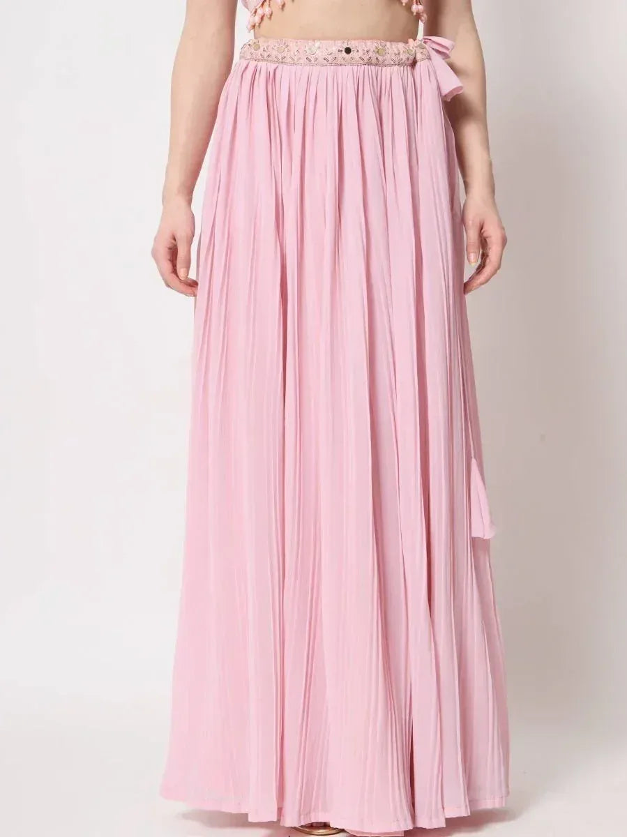 Pink pleated ethnic maxi skirt with embroidered waistband, perfect for Indian wear