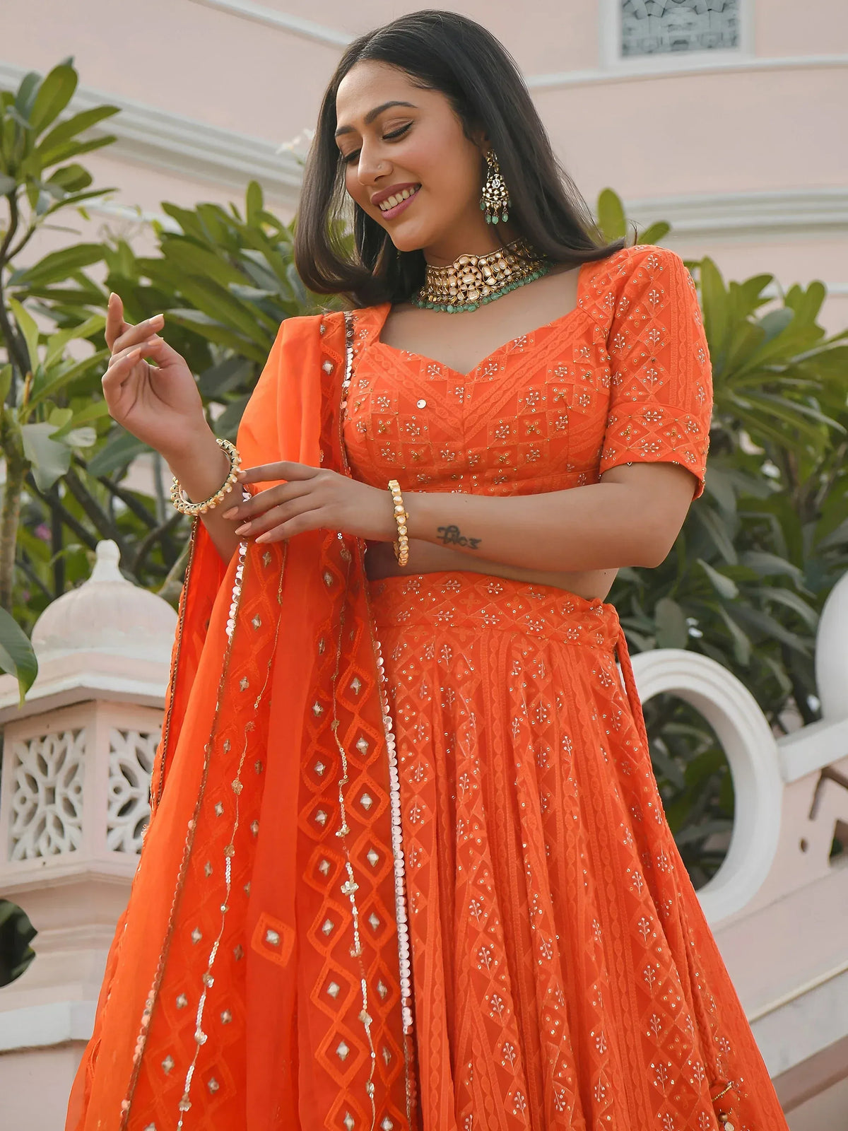 Pretty Orange Sequins Georgette Sangeet Wear Lehenga Choli