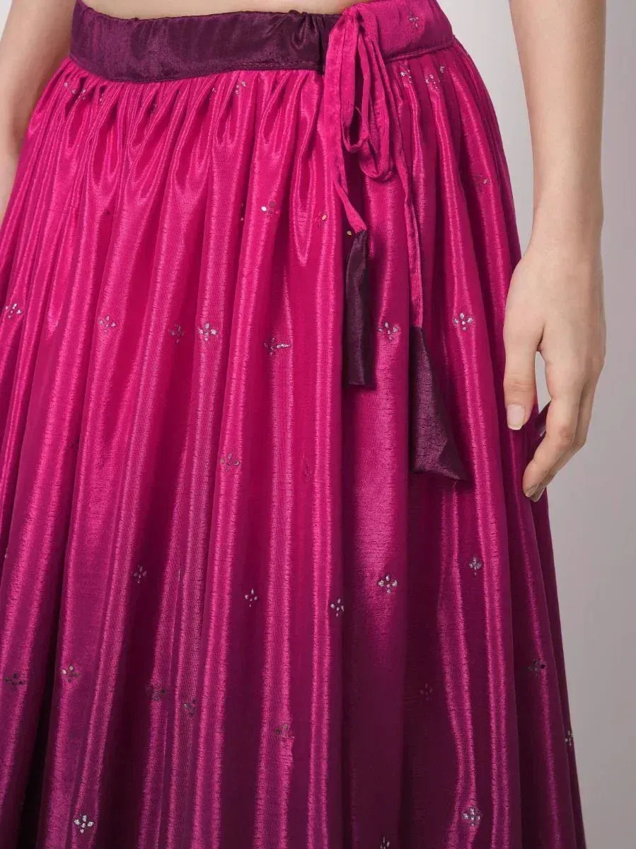 Fuchsia ethnic lehenga skirt with velvet waistband and subtle embroidery, perfect for Indian celebrations