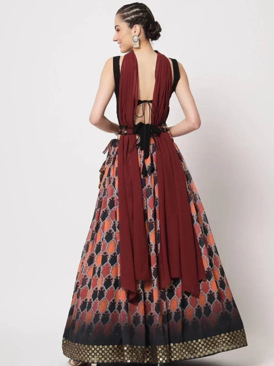 Maroon and black printed lehenga choli with open back and tie-up detail, ethnic Indian wear