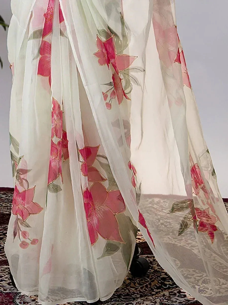 White floral printed saree with pink blossoms, ideal for Indian ethnic wear occasions