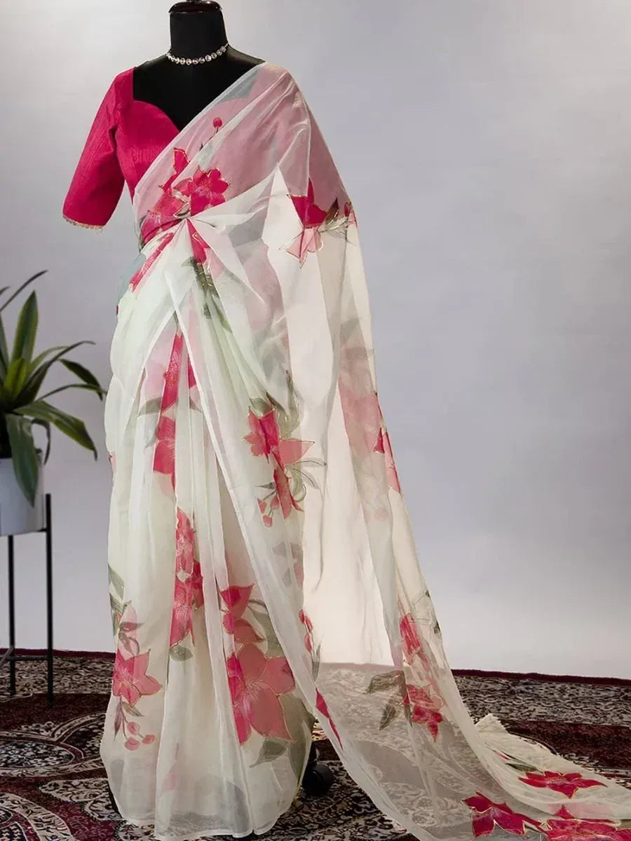 White saree with pink floral print, paired with pink blouse, elegant ethnic wear for women