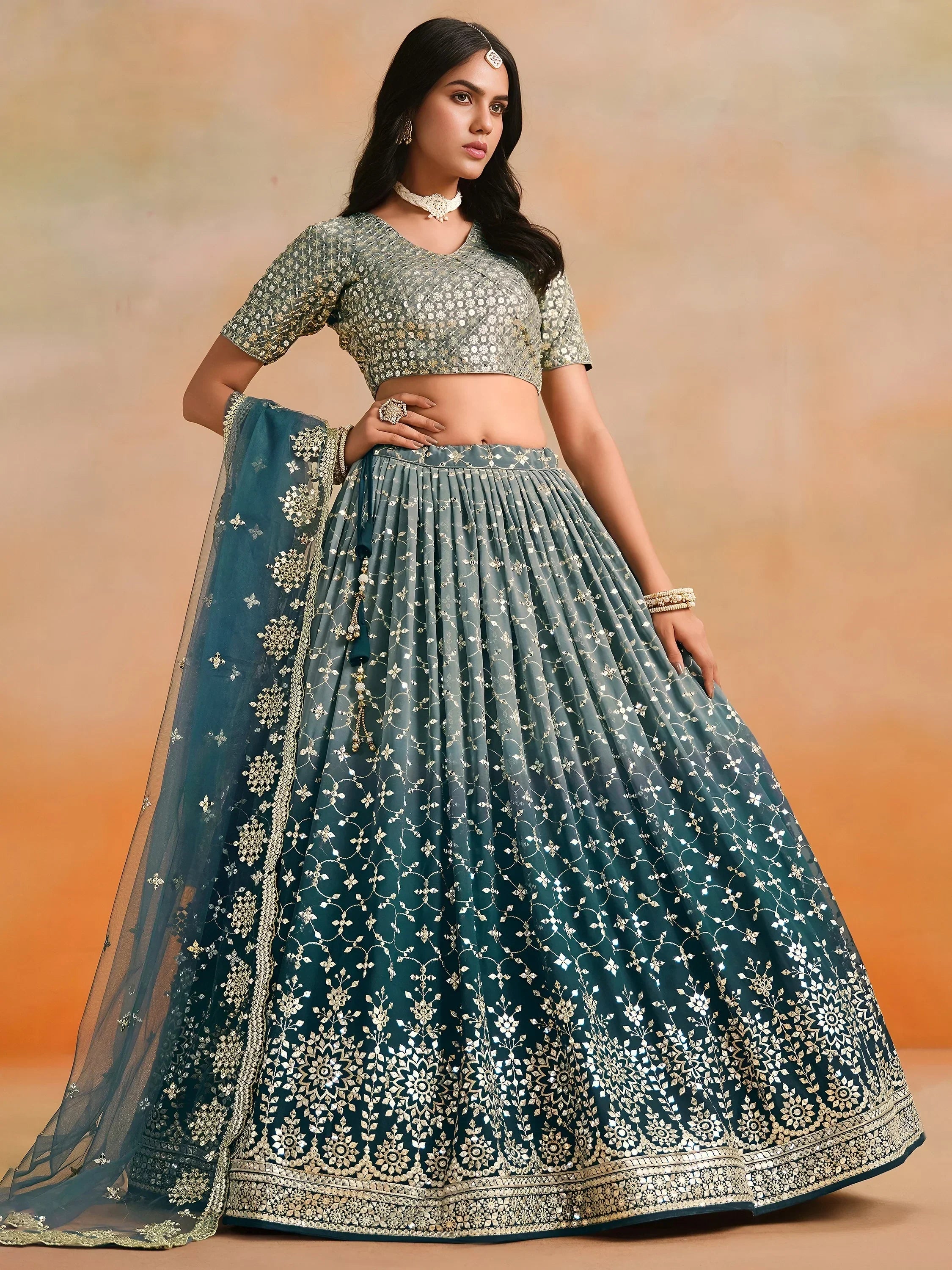 Glamorous Dove Blue Sequins Embroidered Georgette Lehenga Choli