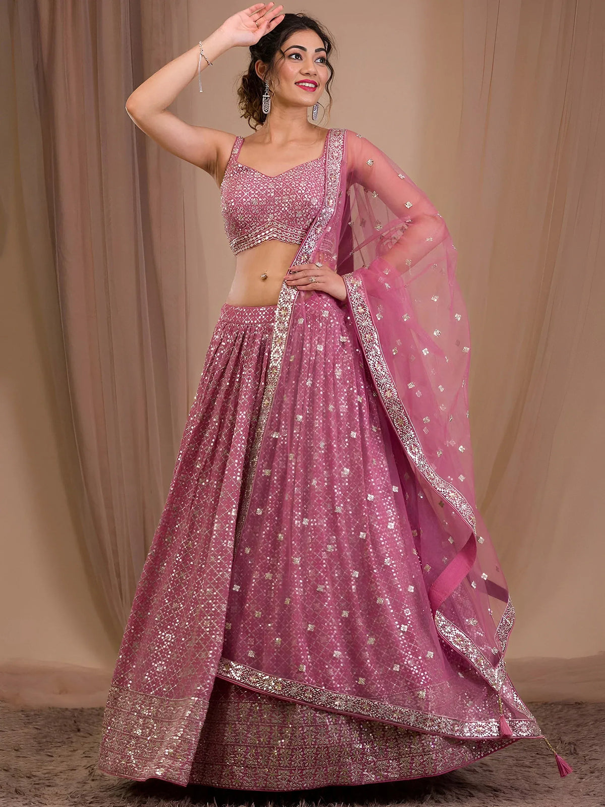 Alluring Pink Sequins Georgette Engagement Wear Lehenga Choli
