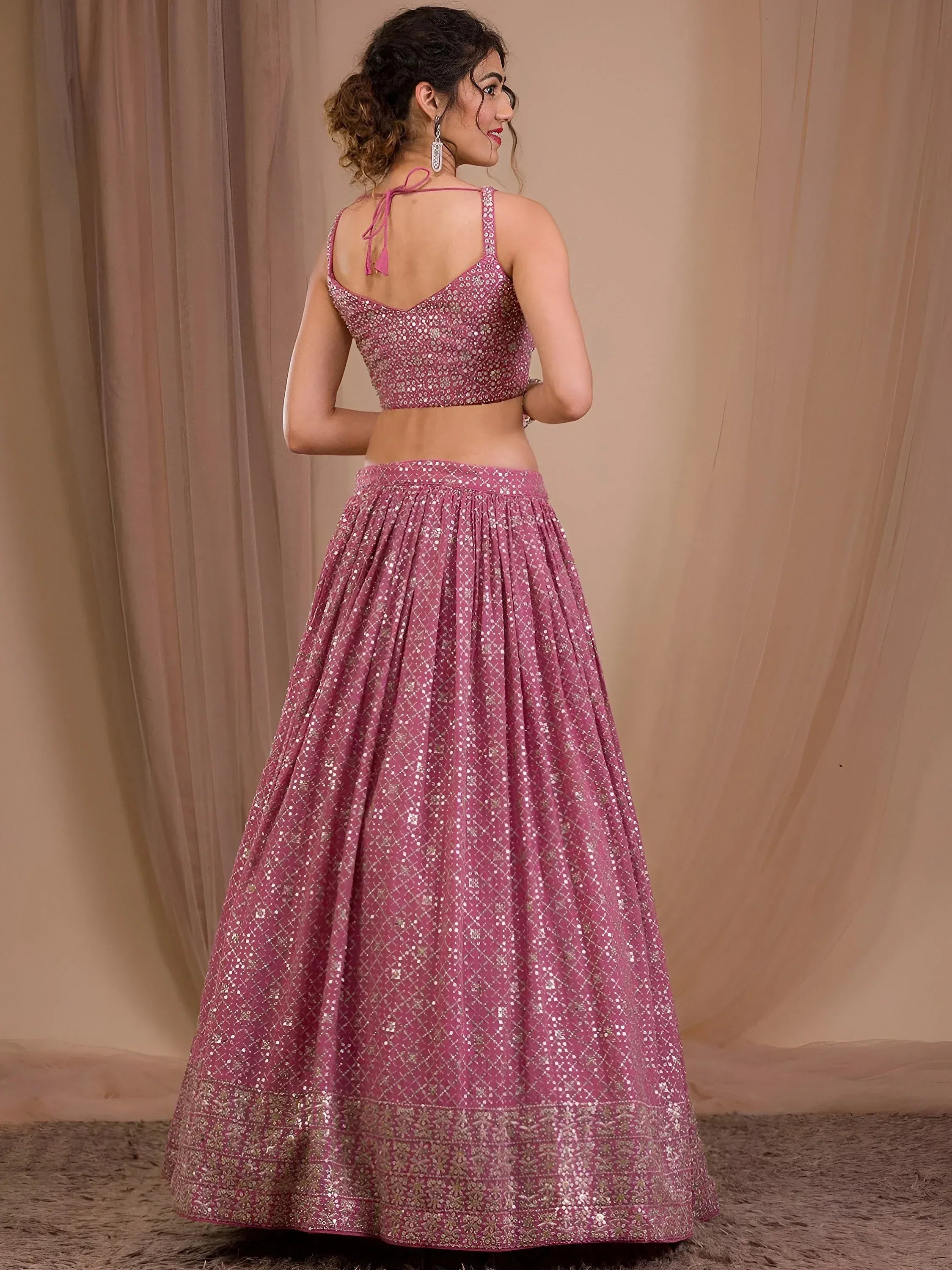 Alluring Pink Sequins Georgette Engagement Wear Lehenga Choli