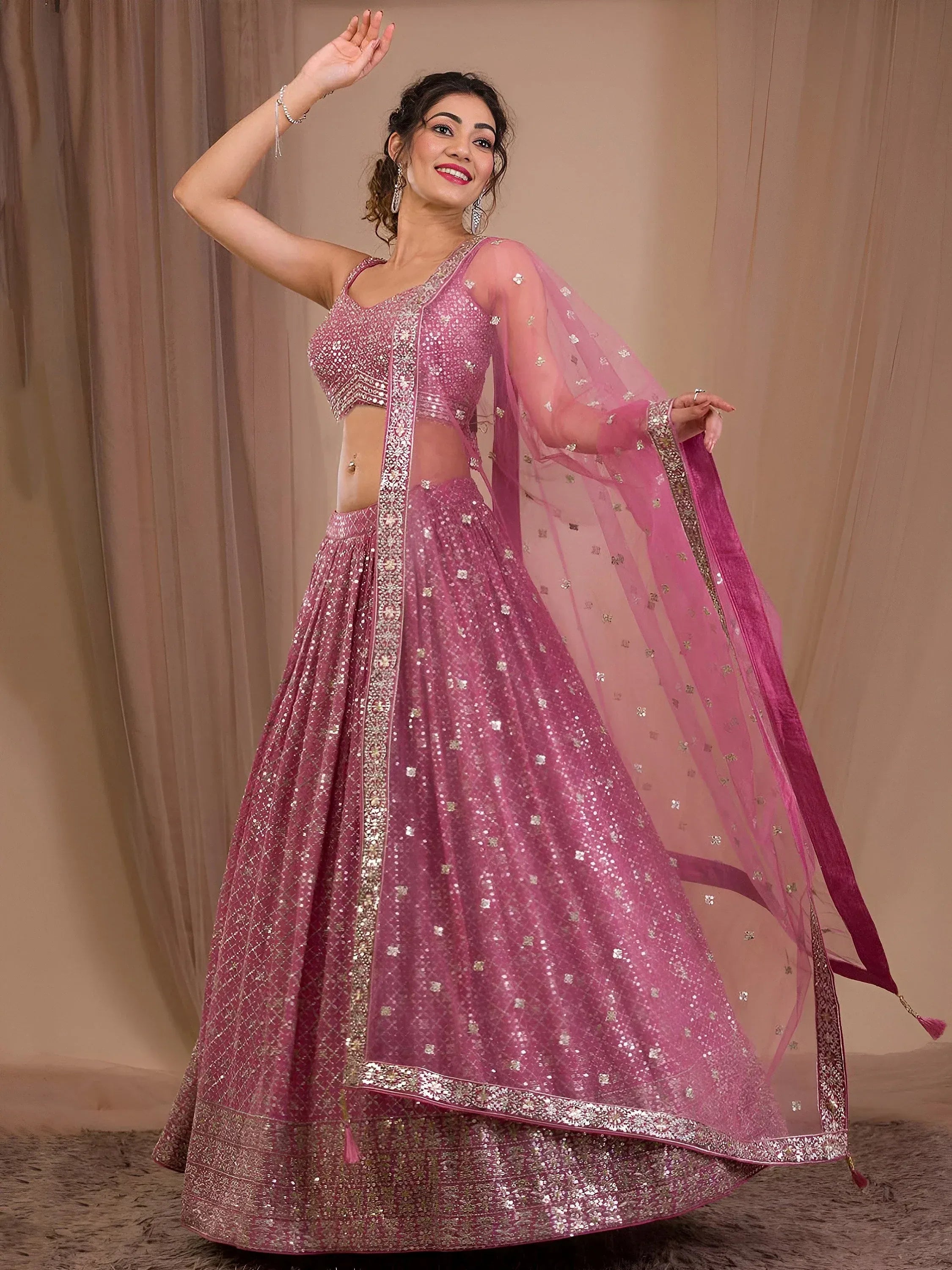 Alluring Pink Sequins Georgette Engagement Wear Lehenga Choli