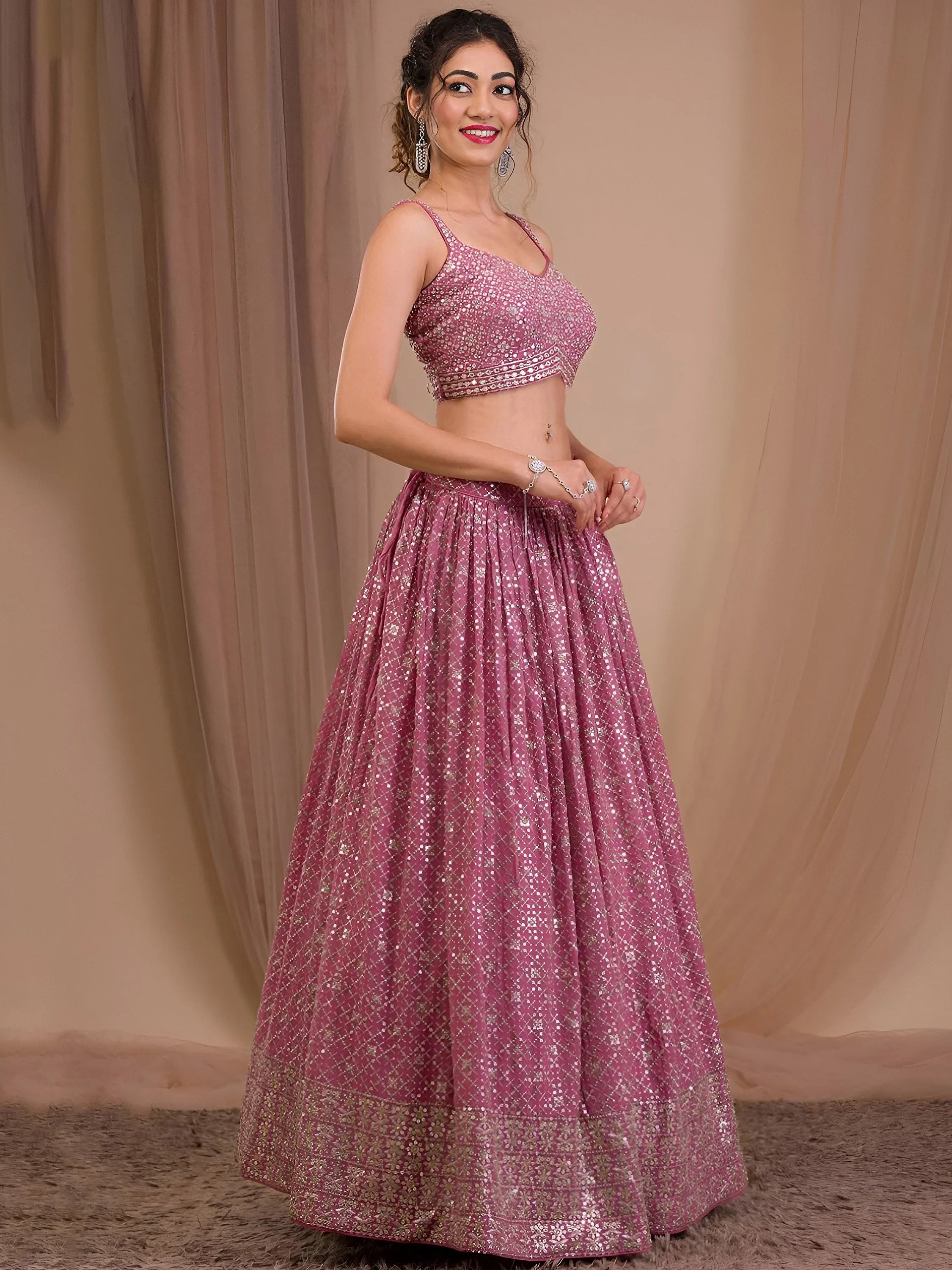 Alluring Pink Sequins Georgette Engagement Wear Lehenga Choli