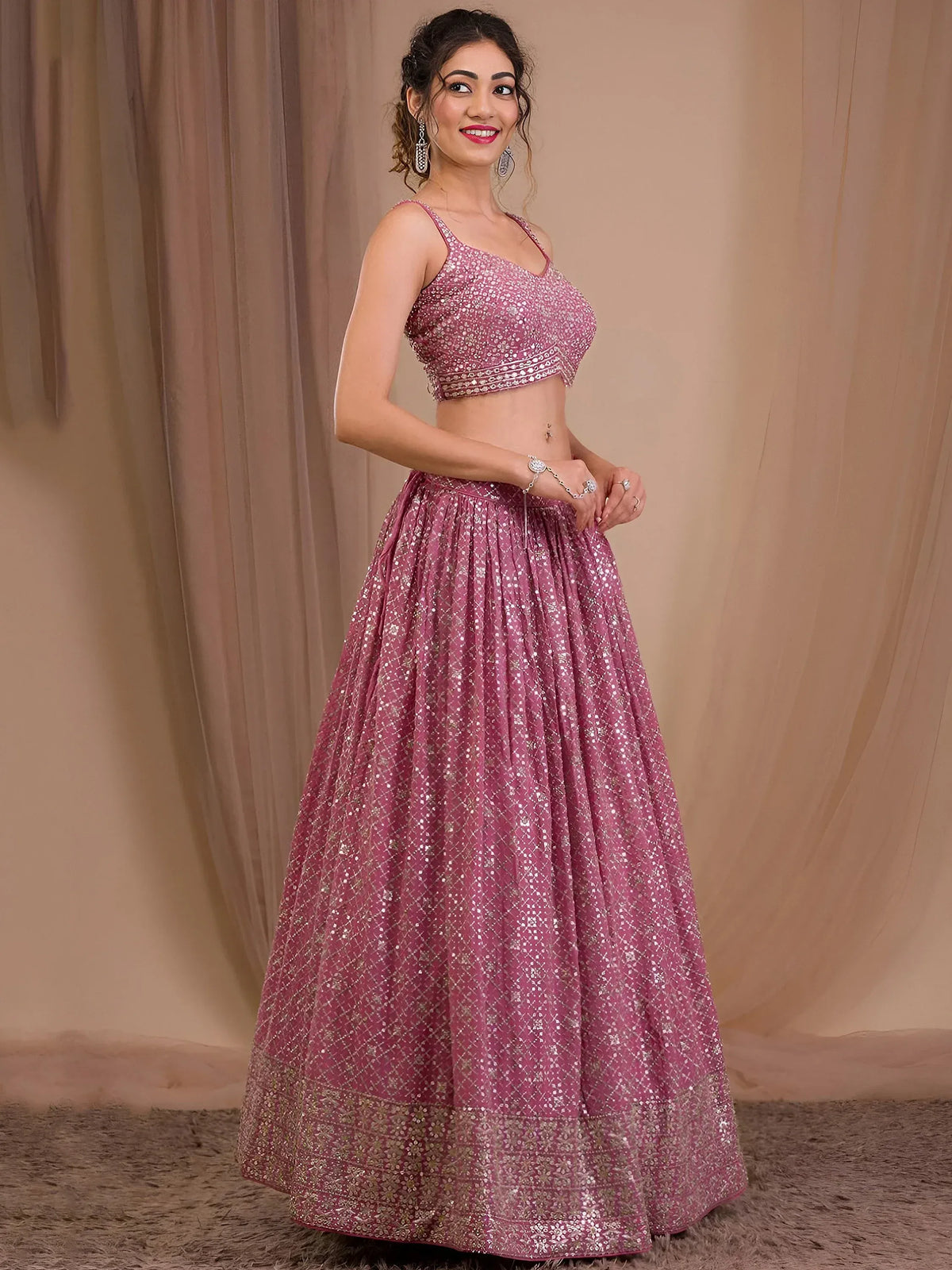 Alluring Pink Sequins Georgette Engagement Wear Lehenga Choli
