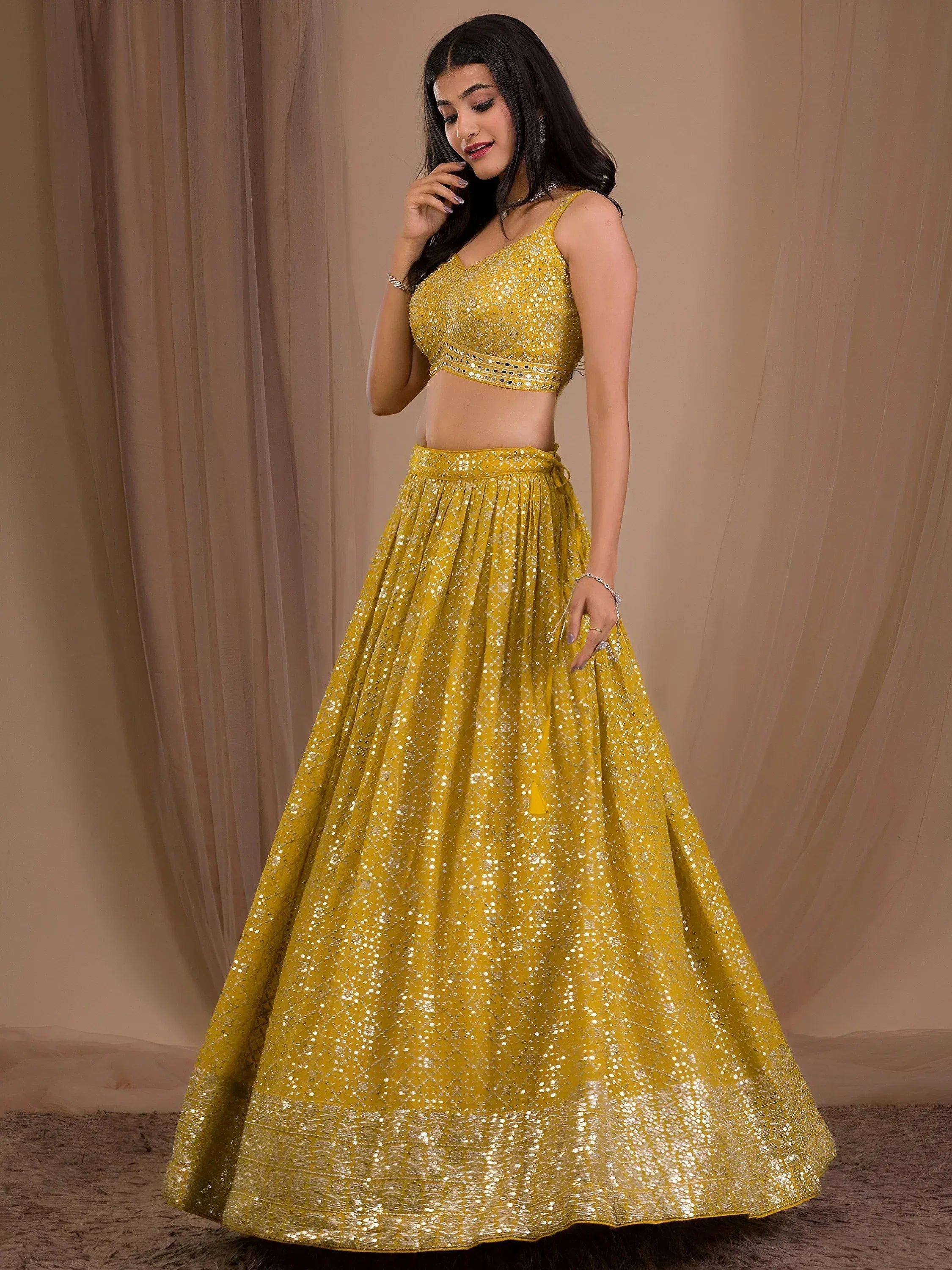 Fascinating Yellow Sequins Georgette Haldi Wear Lehenga Choli