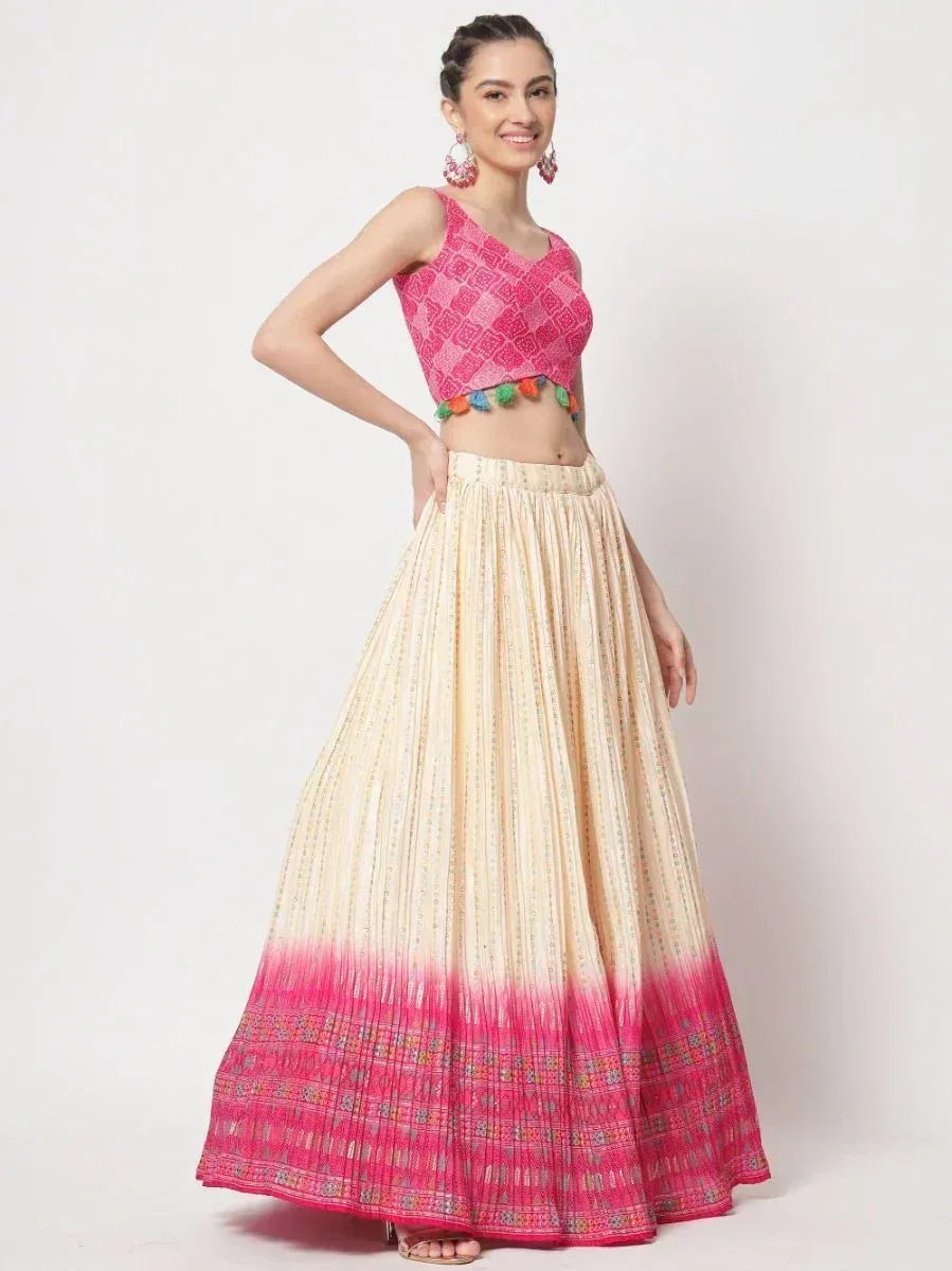 Pink printed crop top with colorful pom-poms and ombre pleated skirt, ethnic wear for women