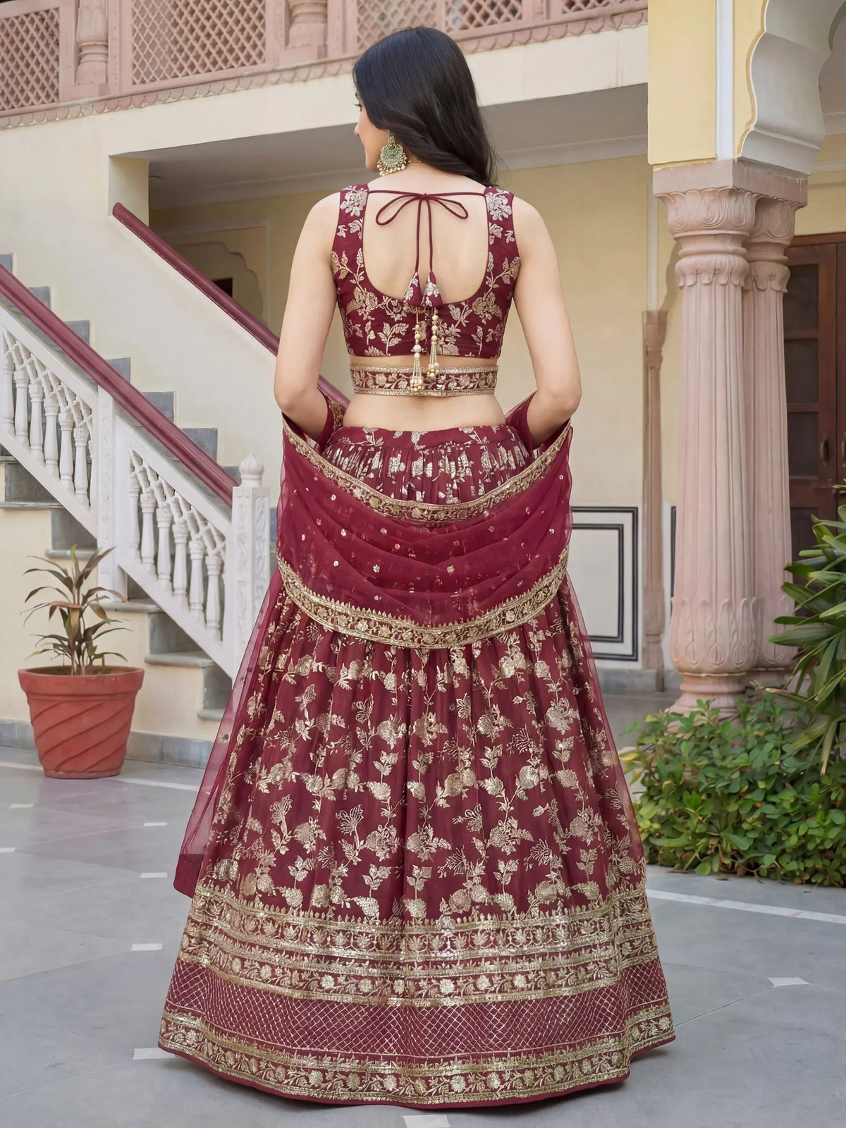 Maroon lehenga choli with gold embroidery, perfect for Indian ethnic wear occasions