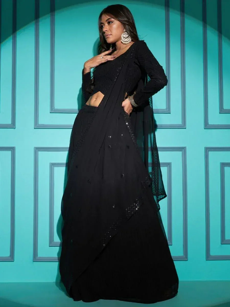 Black embroidered lehenga choli with sheer dupatta, stylish ethnic wear for women