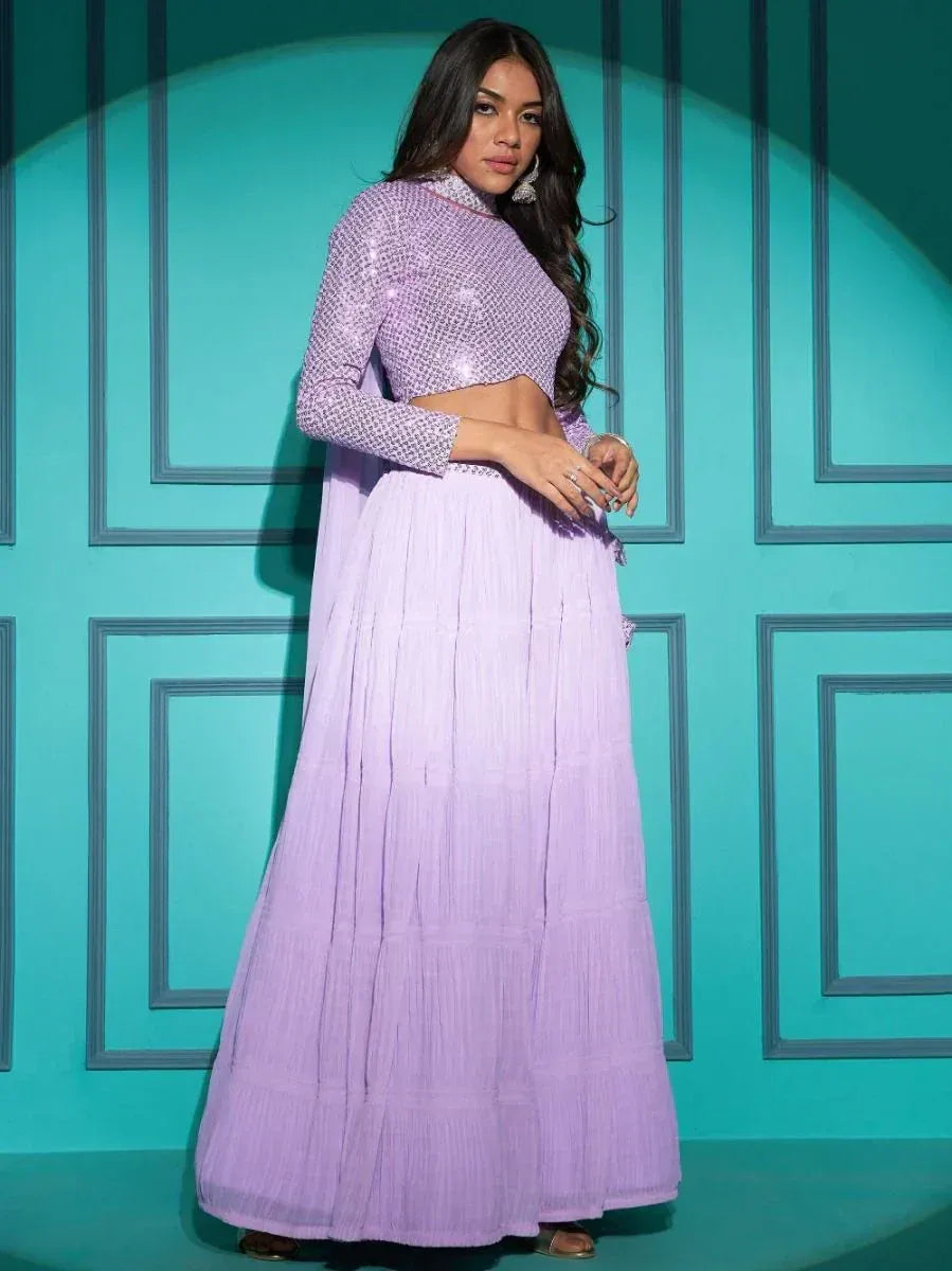 Lavender ethnic lehenga choli with sequin crop top and pleated skirt, perfect for Indian weddings and parties