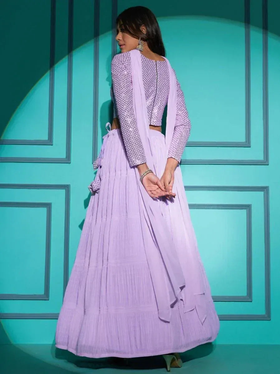 Lavender ethnic lehenga choli with sequin blouse and pleated skirt, perfect for Indian celebrations