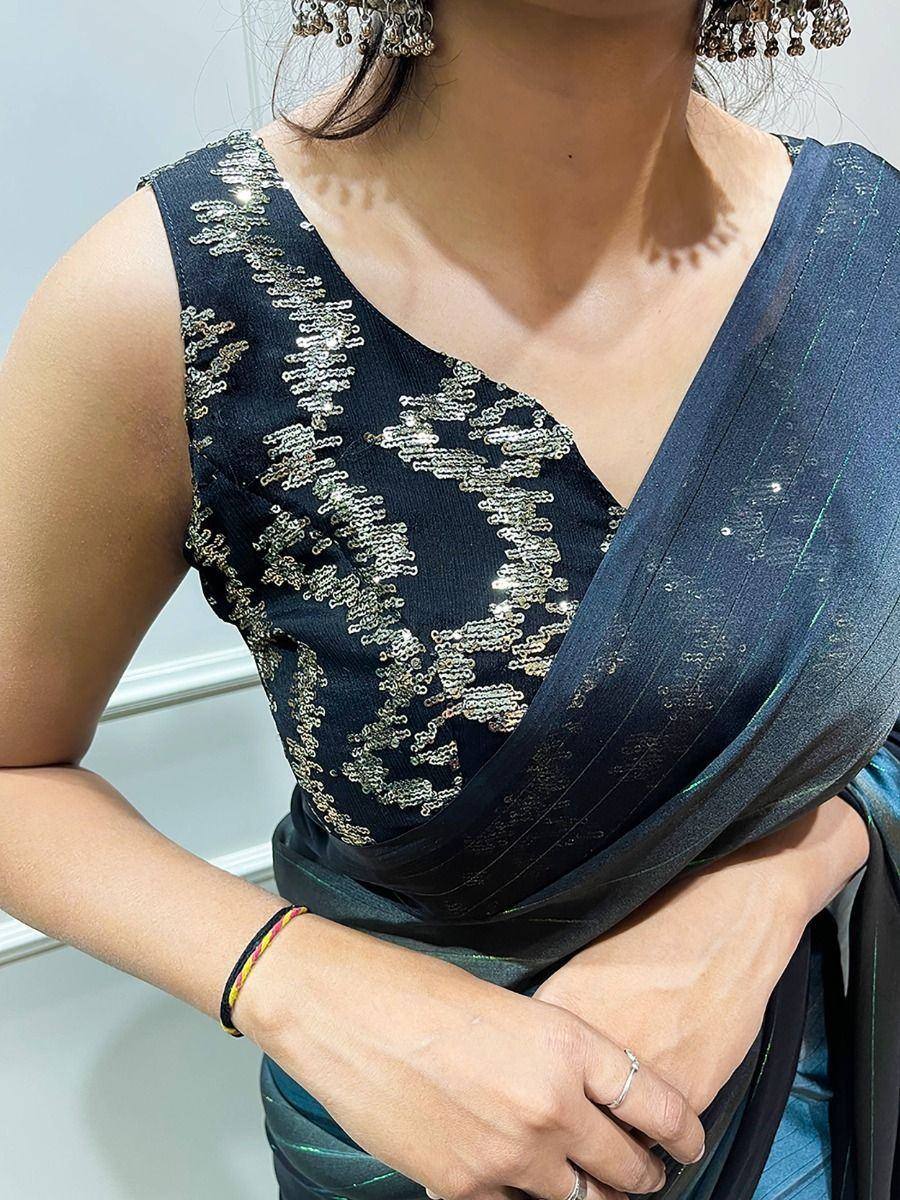 Elegant navy blue saree with gold sequin blouse, perfect for Indian ethnic occasions