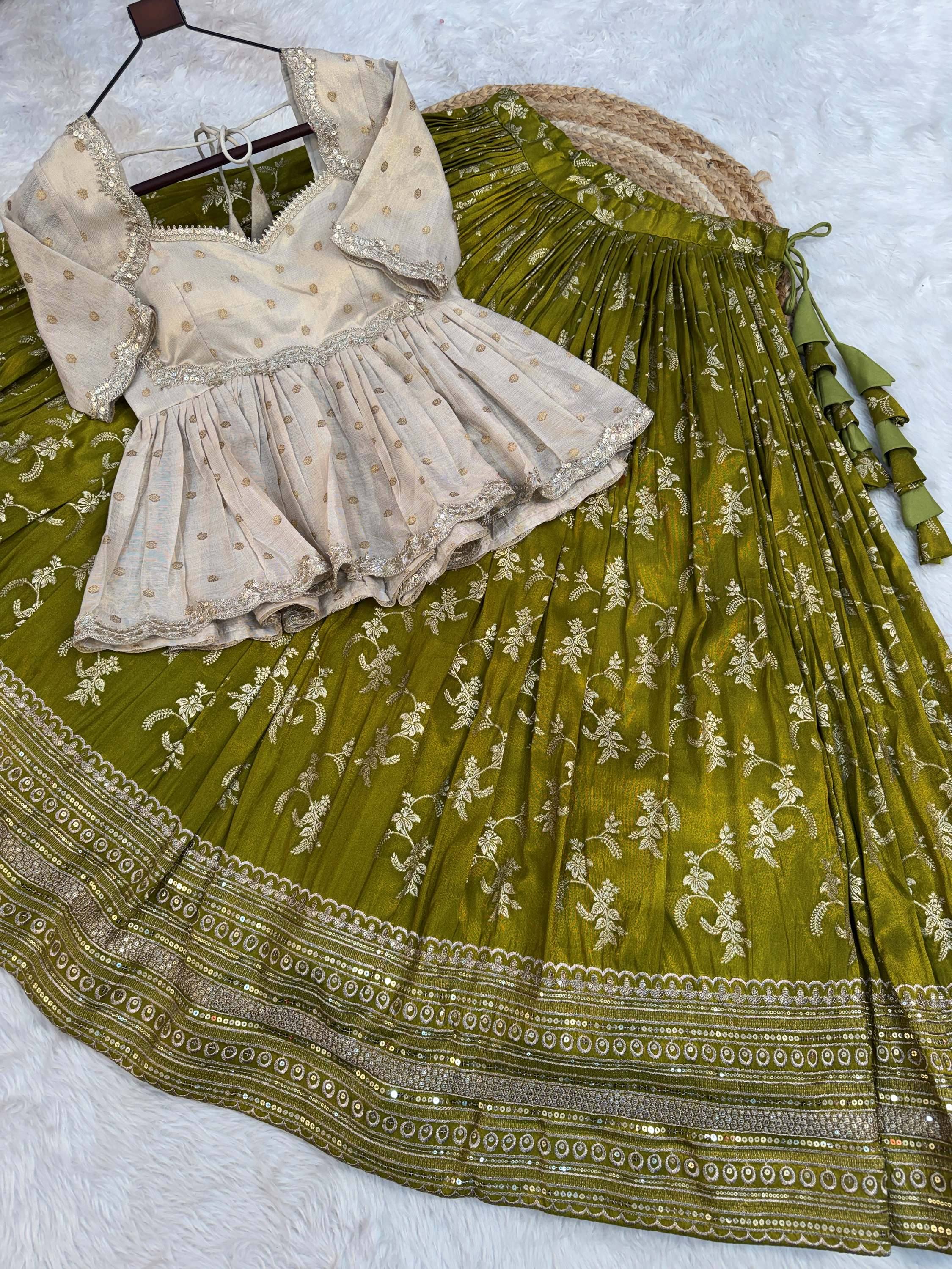 Superb Olive Green Embroidered Silk Mehendi Wear Lehenga With Peplum Top