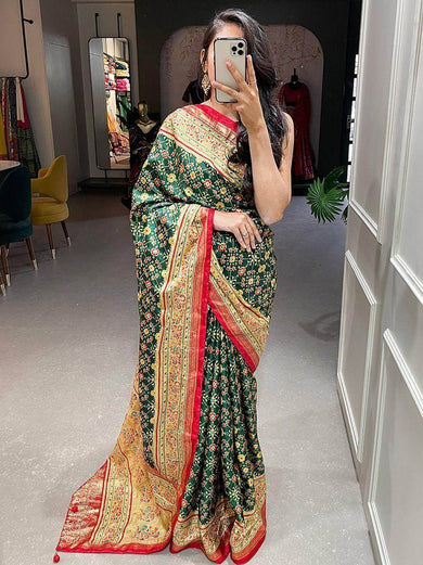 Fascinating Dark Green Patola Print Silk Festival Wear Saree With Blouse