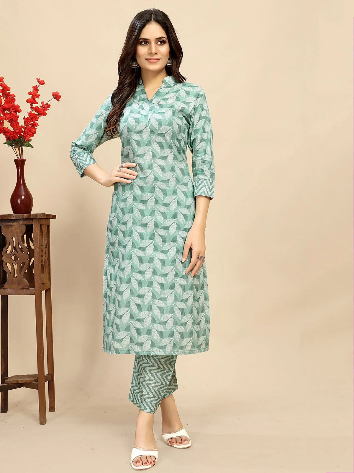 Woman in mint green leaf-print kurta with matching palazzo pants, ethnic wear outfit