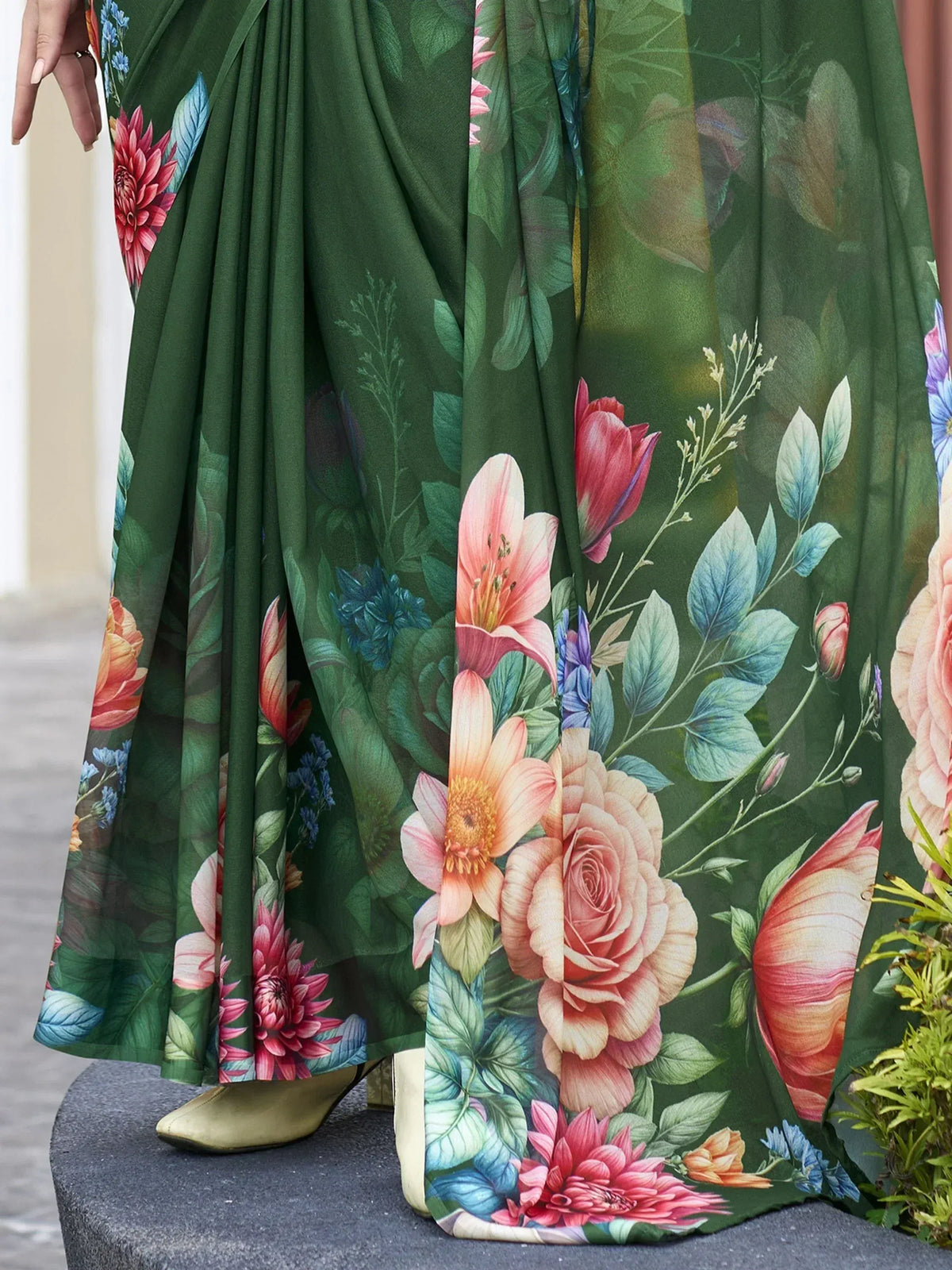 Green floral print ethnic gown with vibrant roses and lilies, perfect for Indian occasions