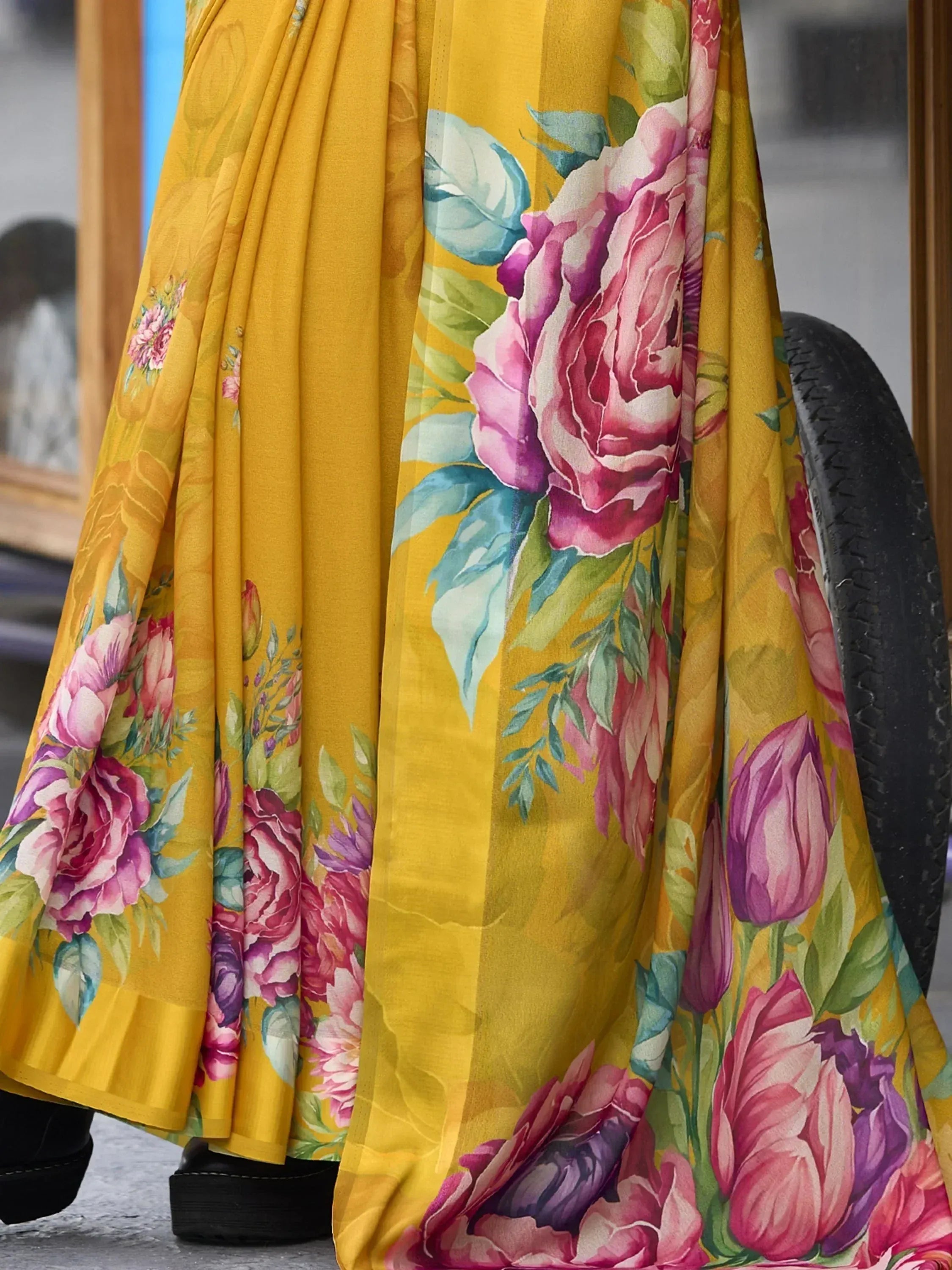 Yellow floral ethnic gown with pink roses, perfect for Indian occasions and festive wear.
