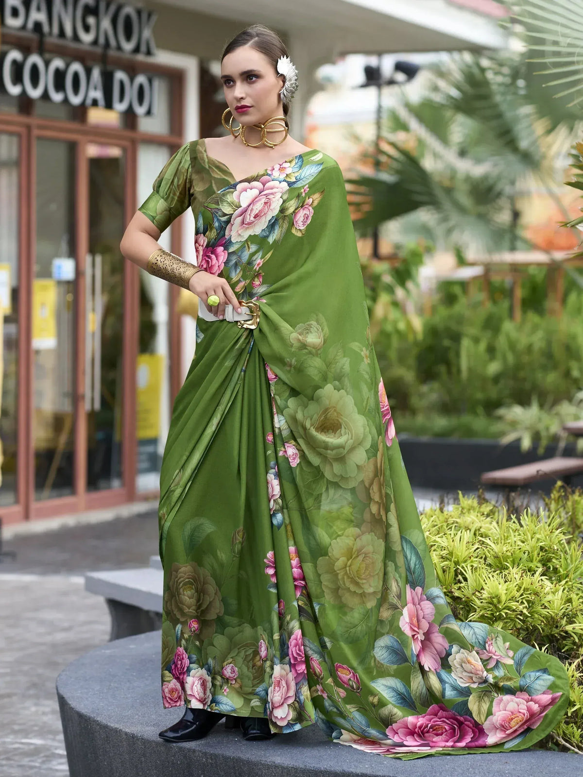 Green floral print saree with pink roses, stylish ethnic wear for women, perfect for festive occasions