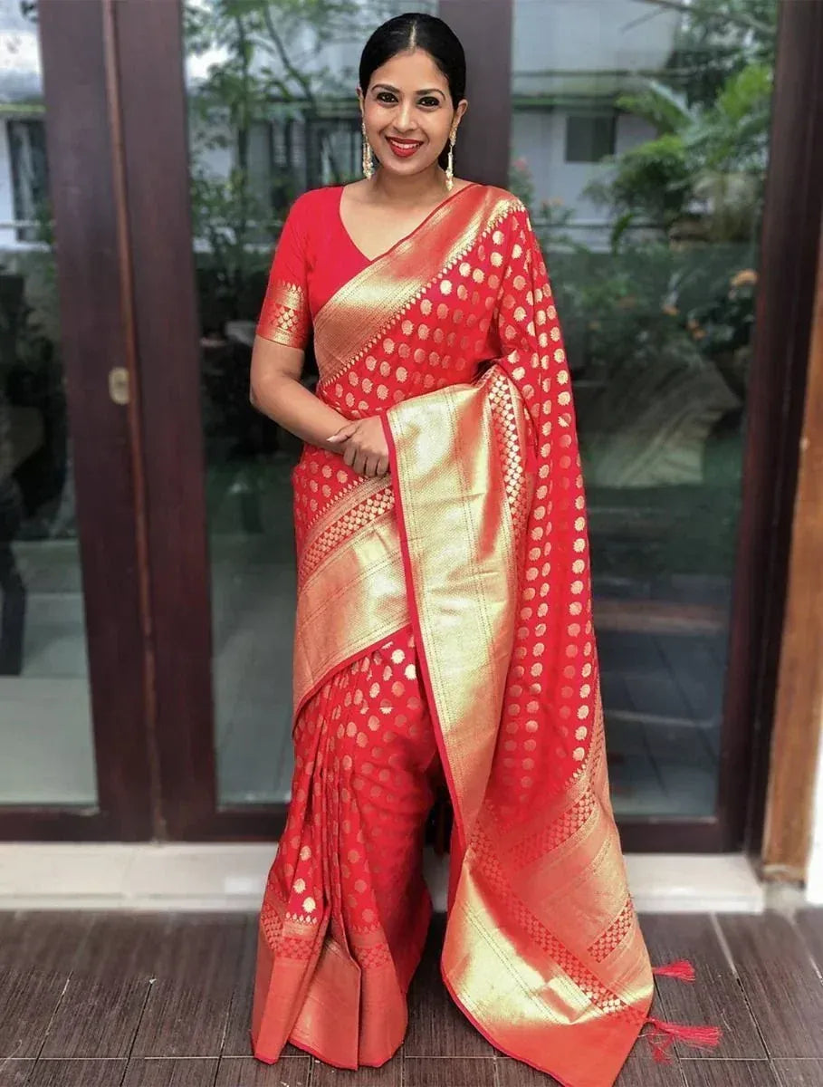 Red and gold designer saree with polka dot pattern, perfect for Indian ethnic wear occasions