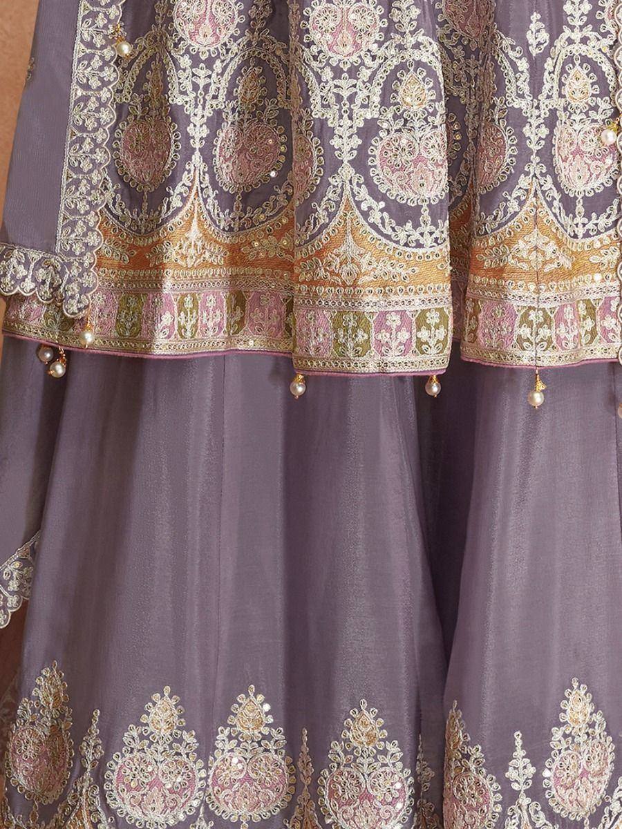 Purple designer lehenga choli with gold and pink embroidery, pearl tassels, ethnic wear