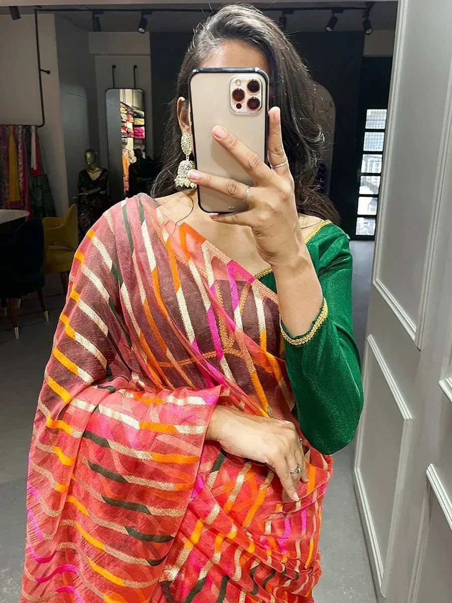 Vibrant striped saree with green blouse, perfect for Indian ethnic wear occasions