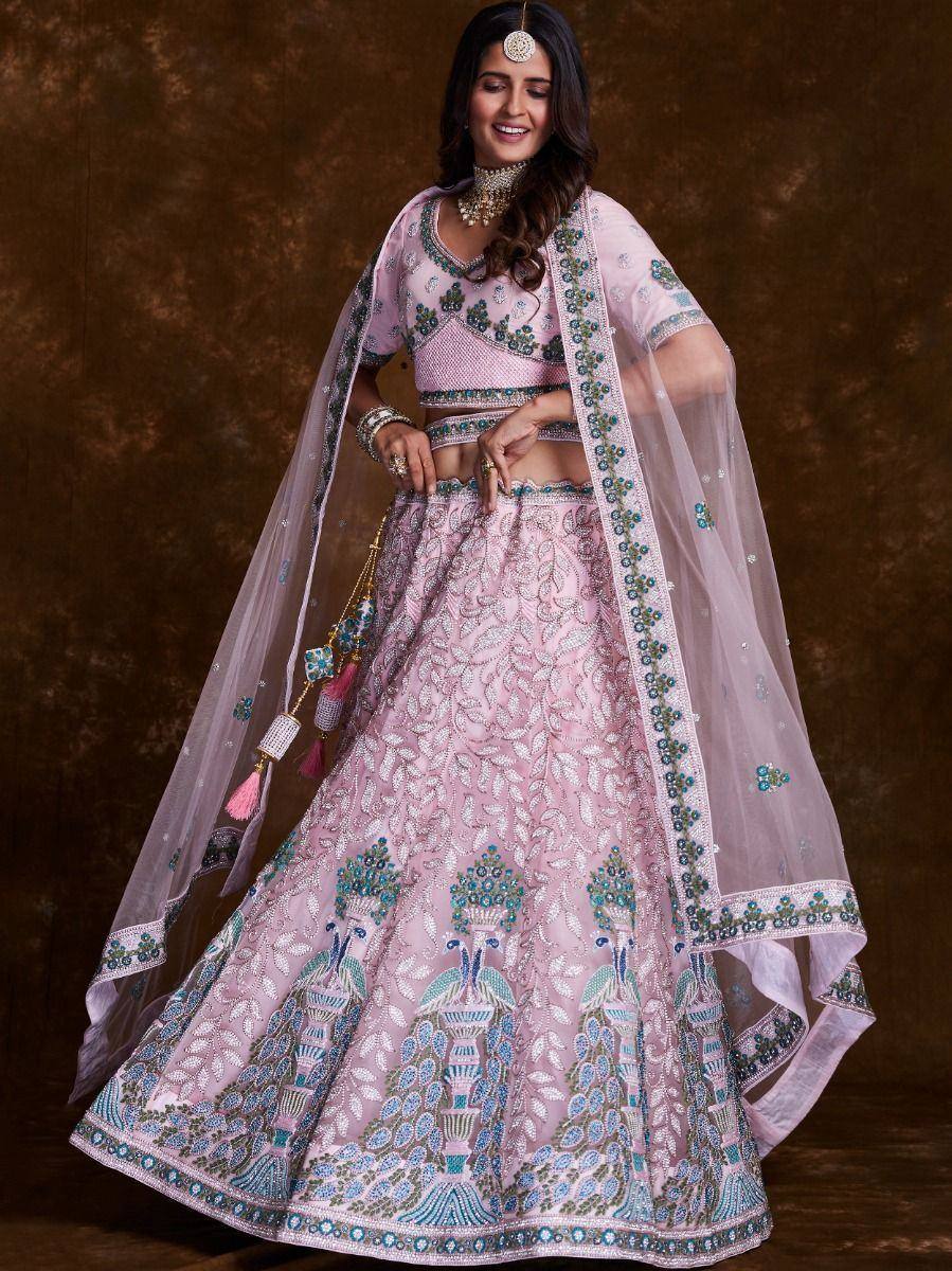 Pink embroidered lehenga choli with peacock motifs and sheer dupatta, Indian ethnic wear