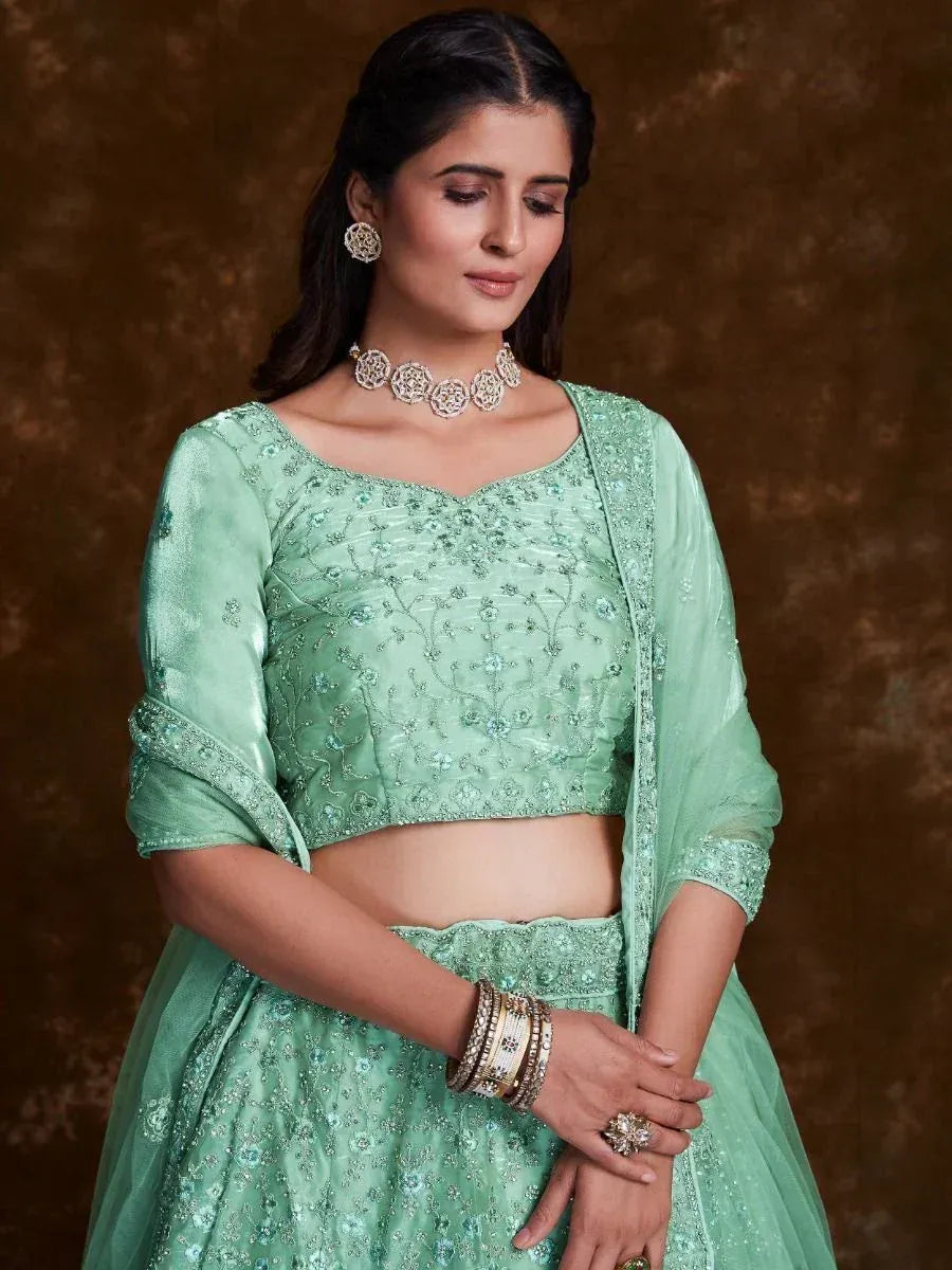Mint green embroidered lehenga choli with matching dupatta, perfect for Indian ethnic occasions