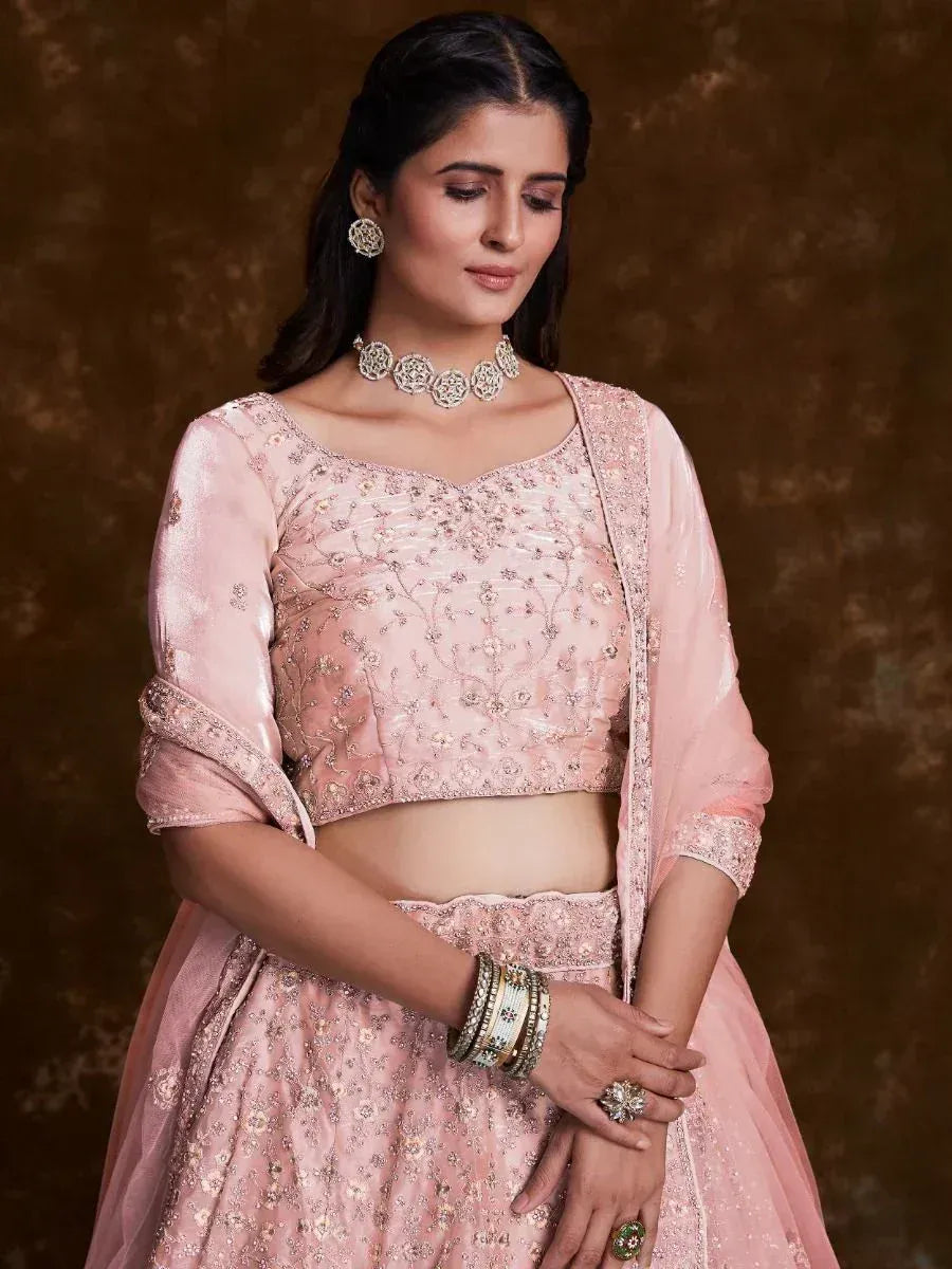 Pink embroidered lehenga choli with floral detailing, perfect for Indian ethnic wear occasions