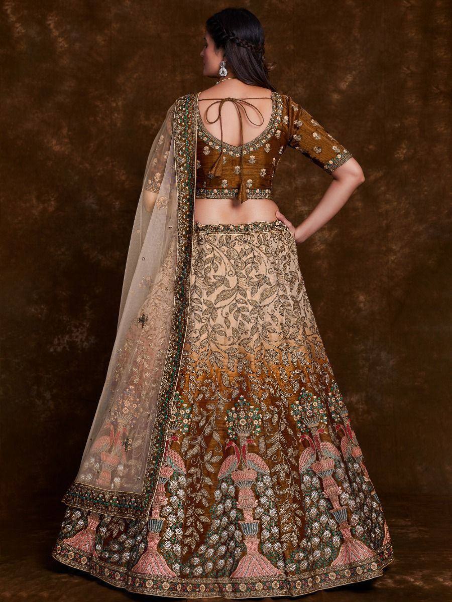 Designer lehenga choli with floral embroidery and peacock motifs, perfect for Indian ethnic wear occasions.