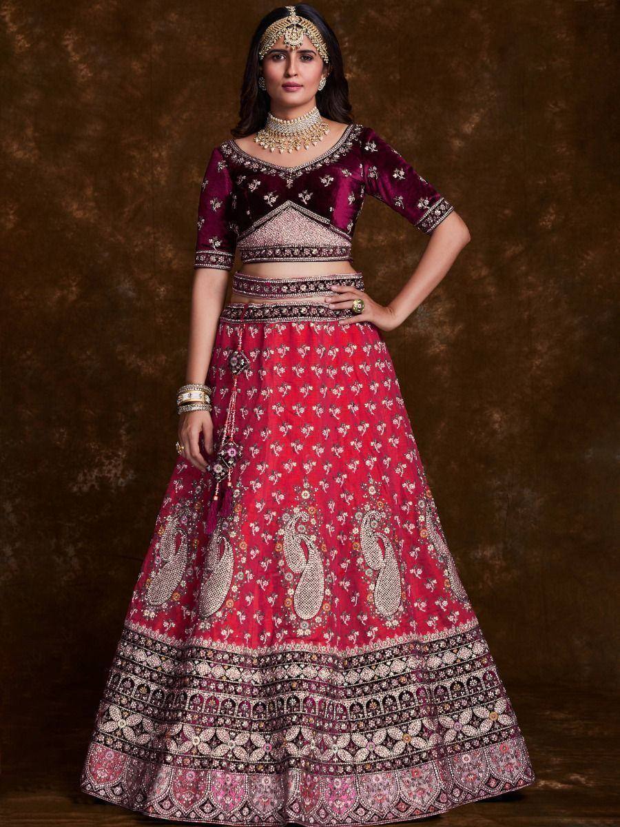Maroon and red embroidered lehenga choli with velvet blouse, perfect for Indian weddings and festive occasions