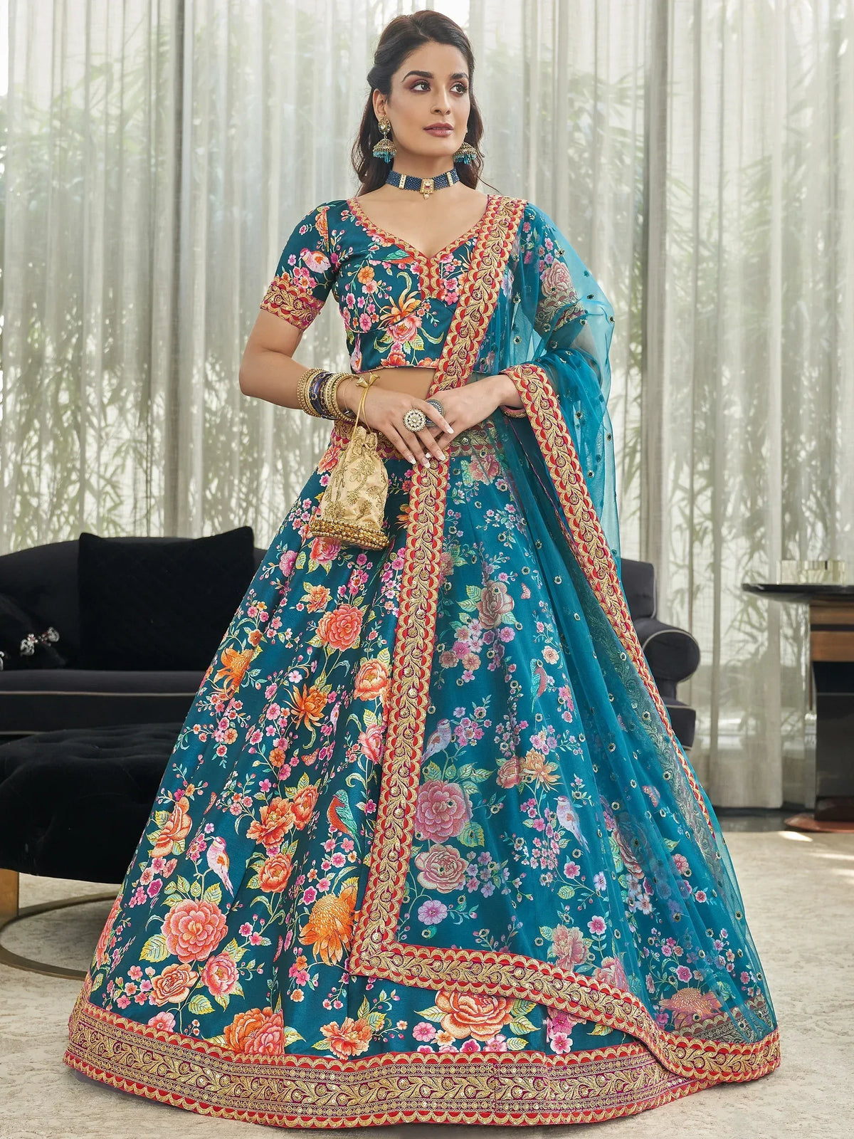 Teal floral lehenga choli with gold embroidery, perfect for Indian weddings and festive occasions
