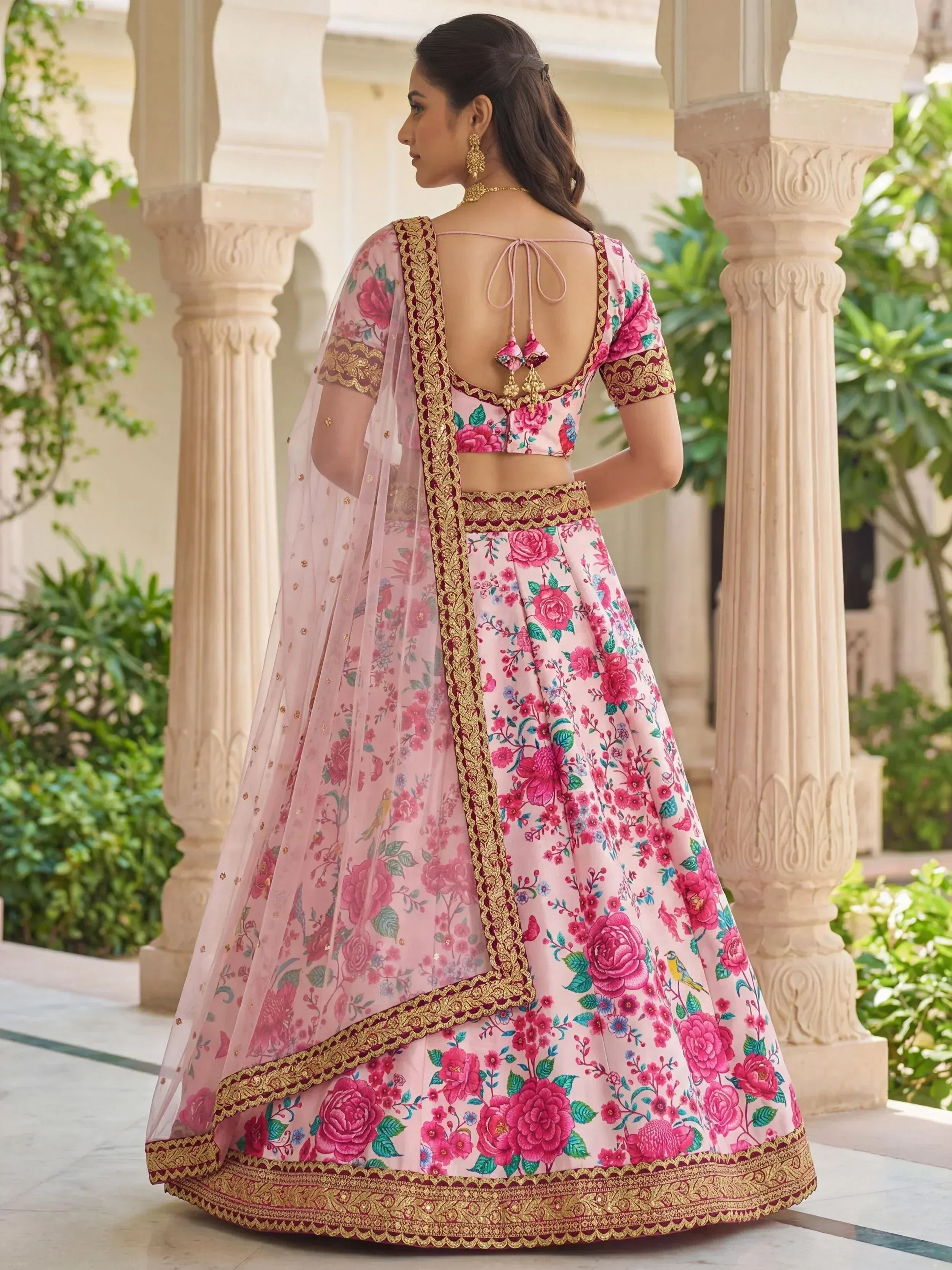 Pink floral lehenga choli with gold embroidery, back view, Indian ethnic wear
