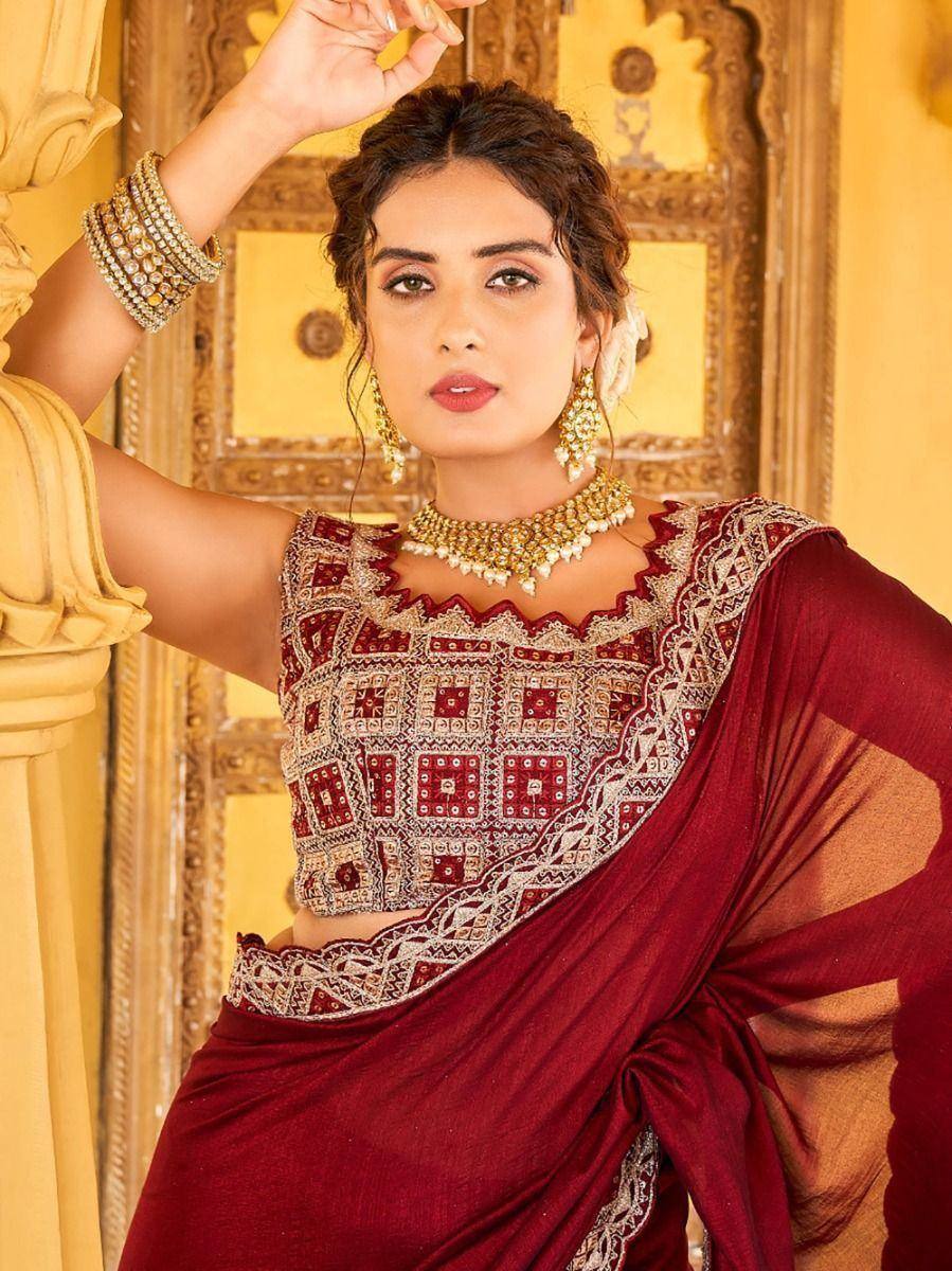 Maroon embroidered saree with designer blouse, traditional Indian ethnic wear, gold jewelry
