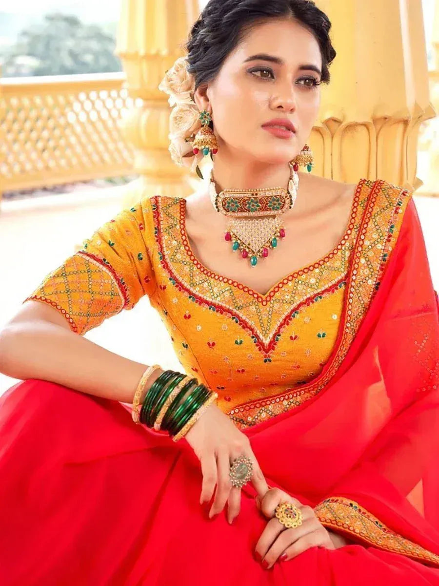 Yellow embroidered blouse with red saree, traditional Indian ethnic wear, designer jewelry