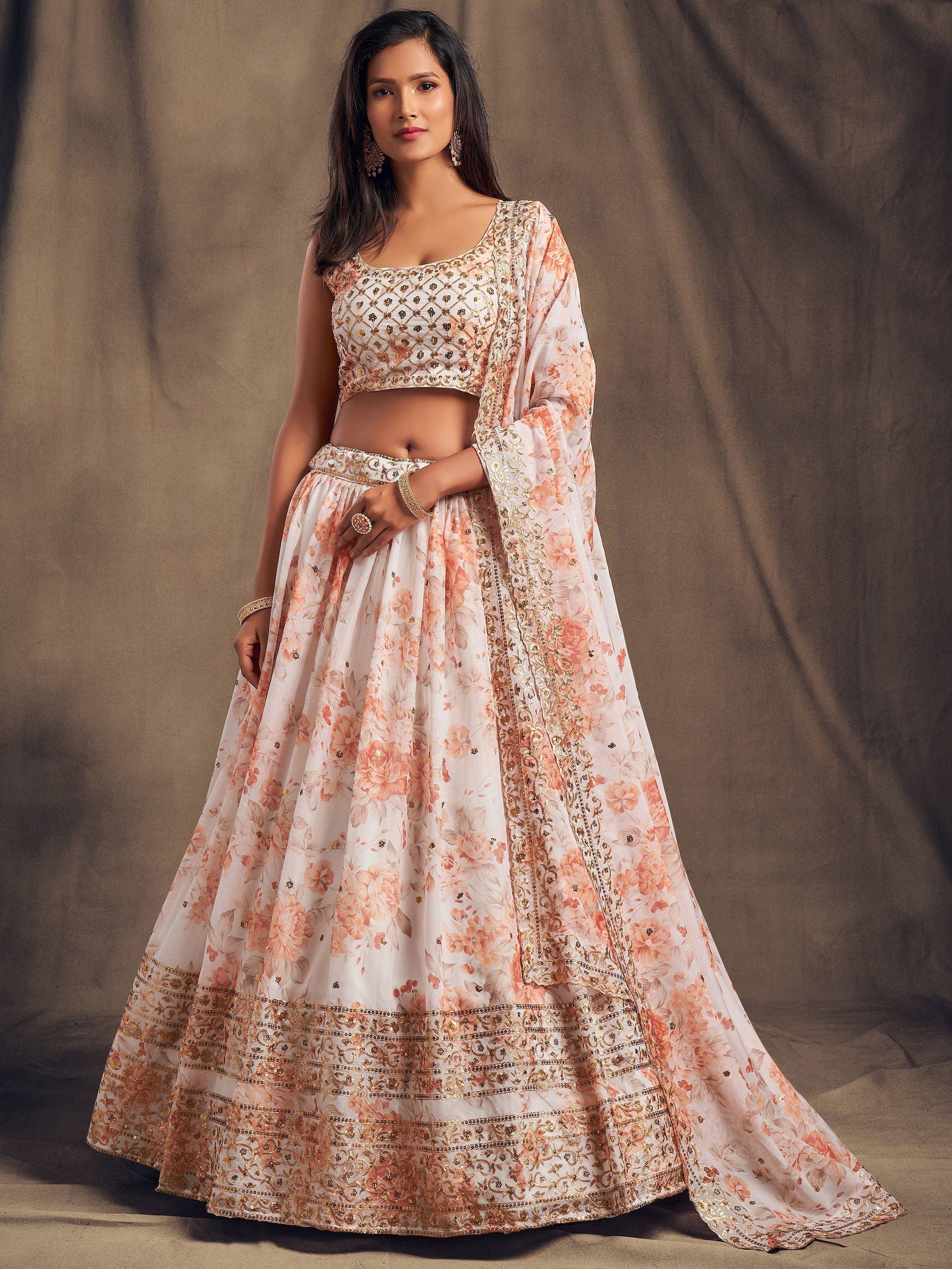 Elegant floral lehenga choli with gold embroidery, perfect for Indian ethnic wear events.