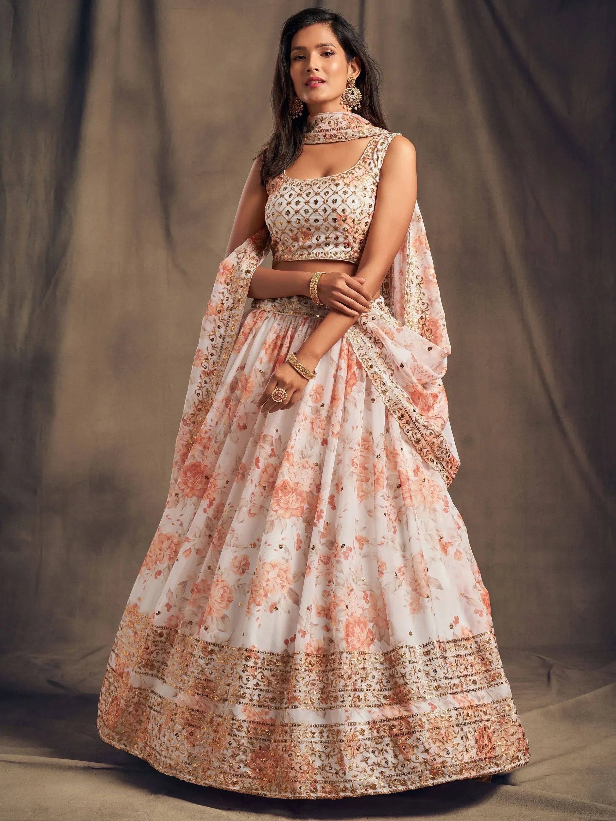 Floral print lehenga choli with gold embroidery, perfect for Indian weddings and festive occasions