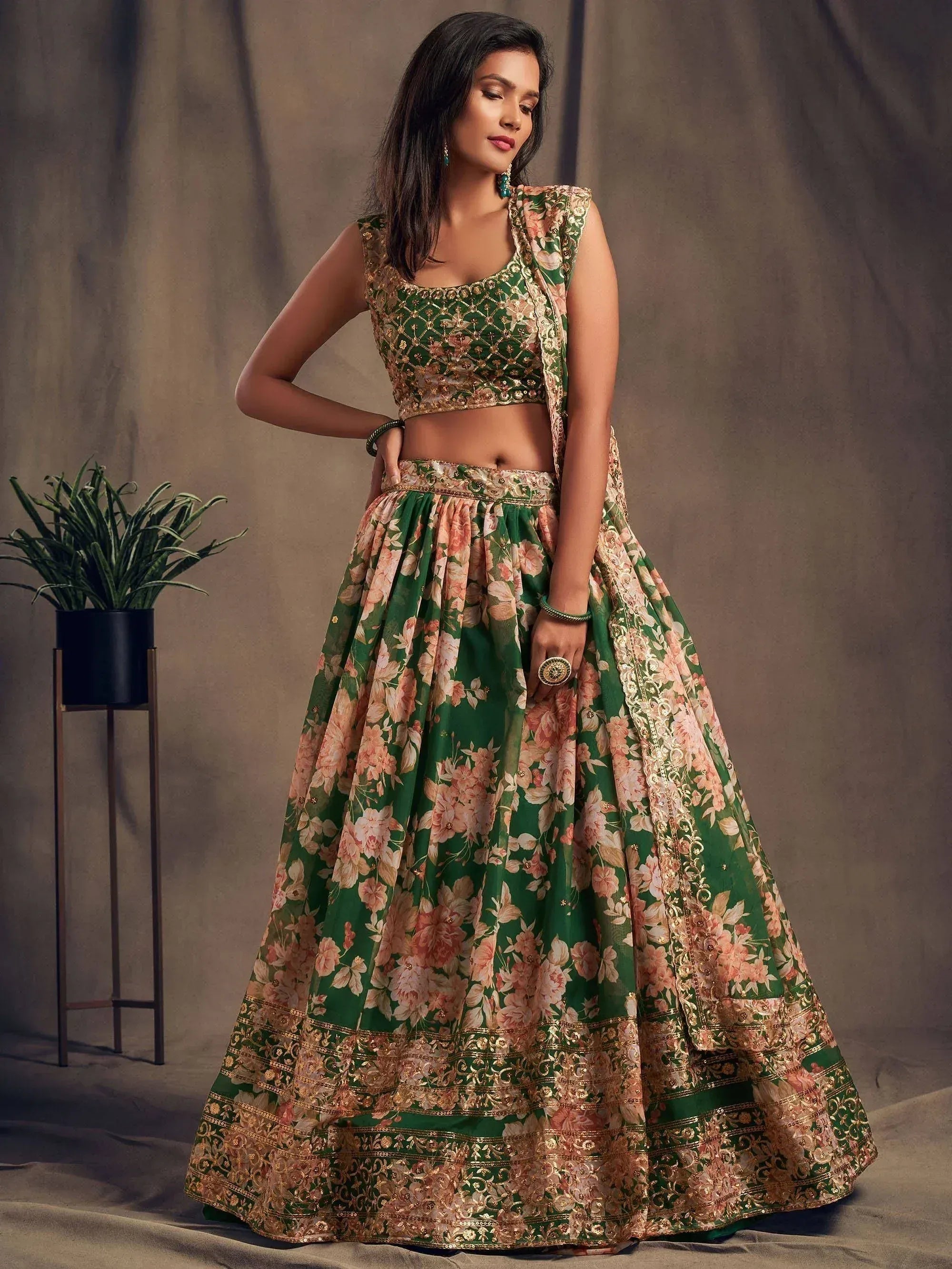 Green floral lehenga choli with gold embroidery, perfect for Indian ethnic wear occasions